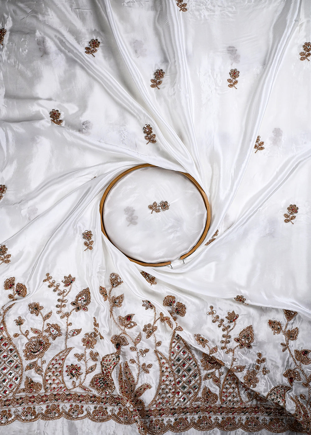 White Dyeable Crepe Fabric With All Over Zari, Sequins And Katdana Work With One Side Heavy Border 27034