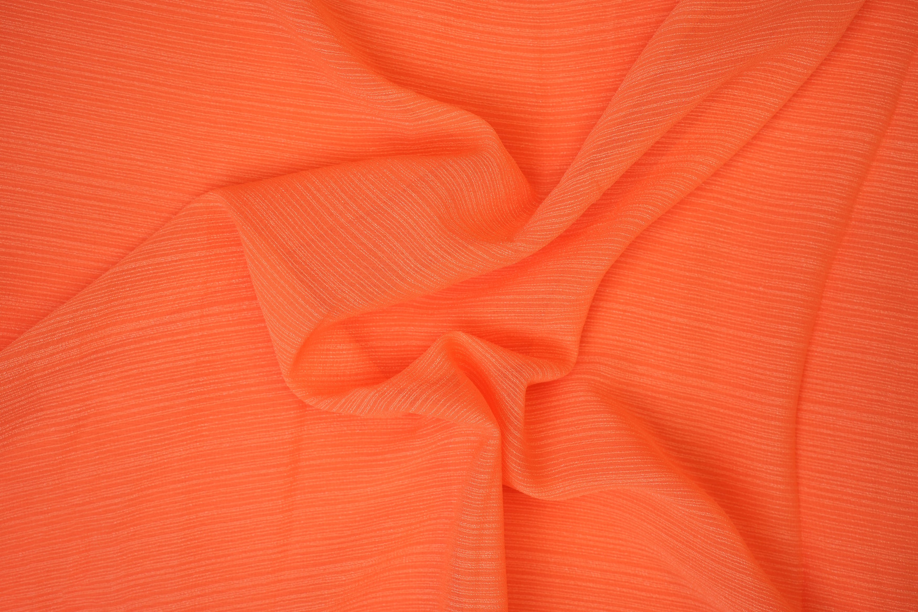 Bright orange coloured barbie chiffon fabric