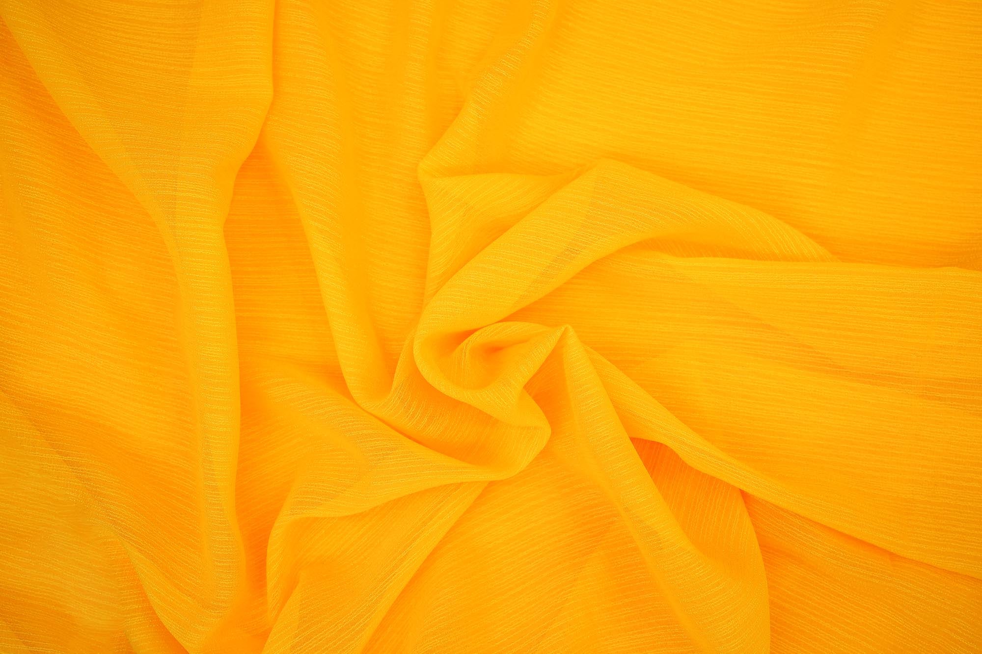 Yellow coloured barbie chiffon fabric