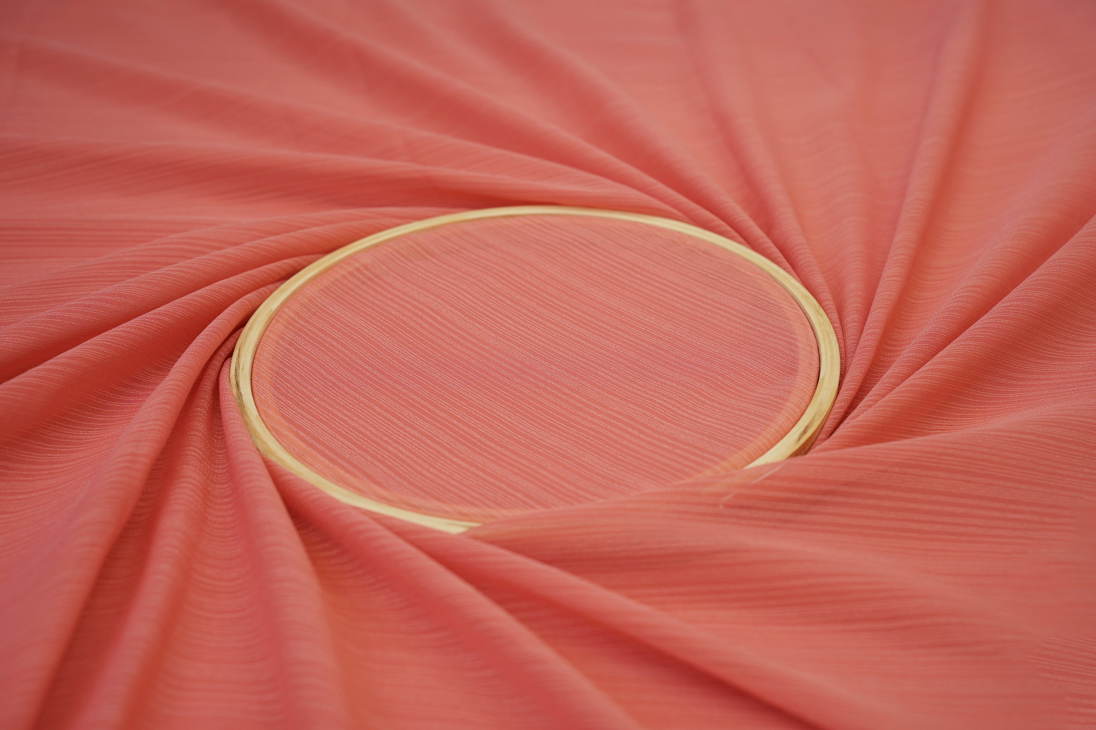 Peach coloured barbie chiffon fabric