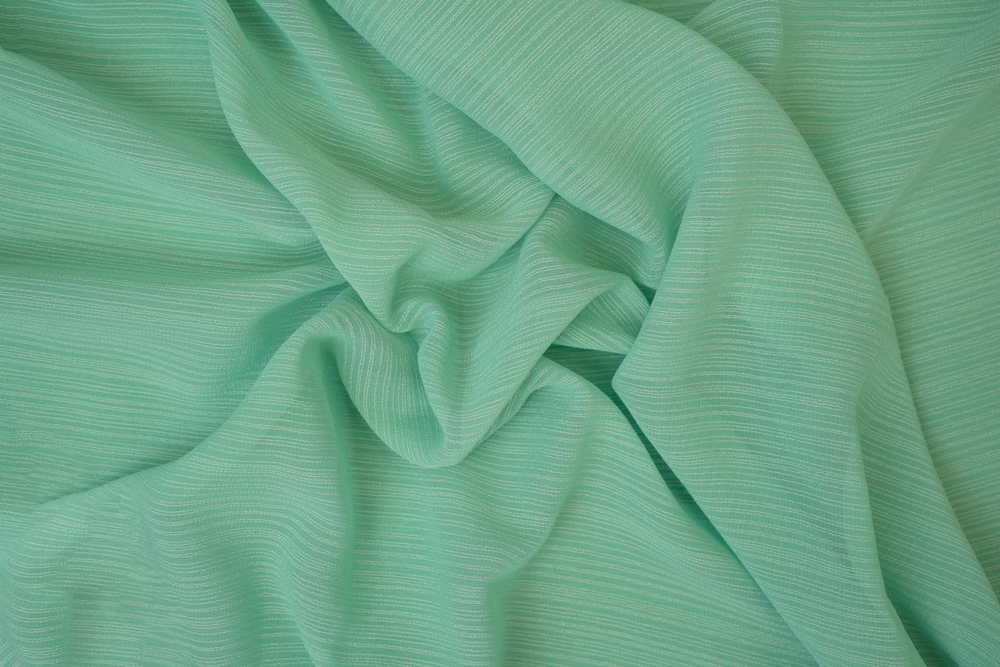 Sea green coloured barbie chiffon fabric