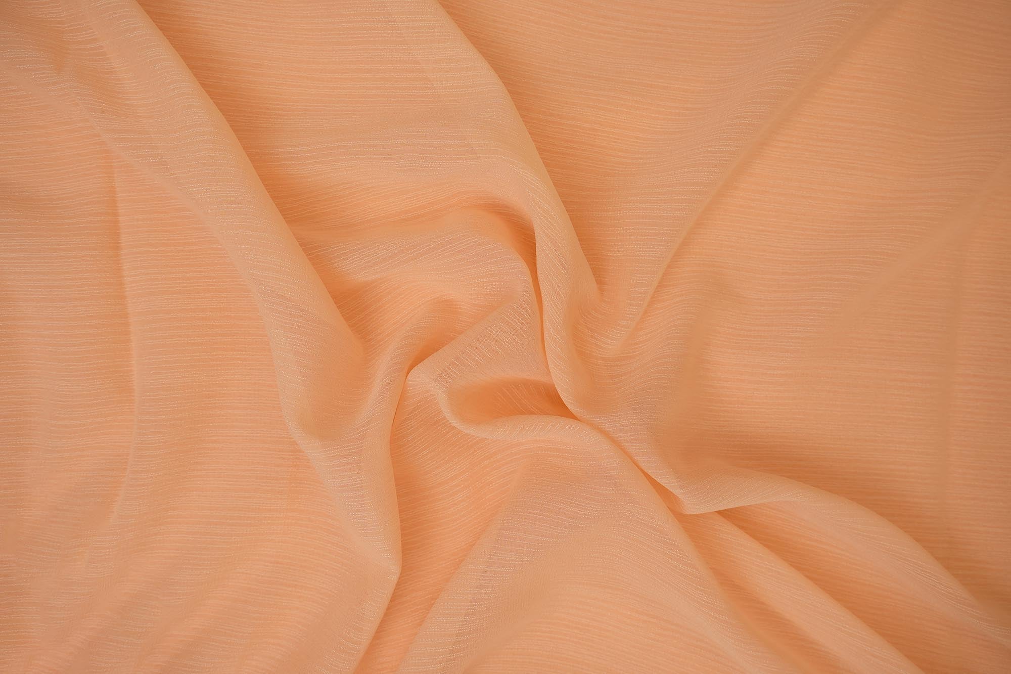 Bright peach coloured barbie chiffon fabric