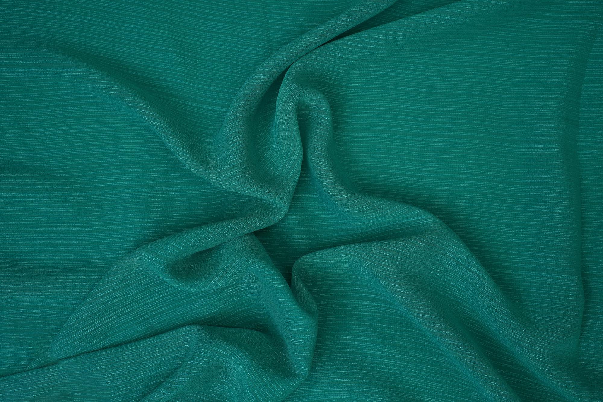 Rama green coloured barbie chiffon fabric