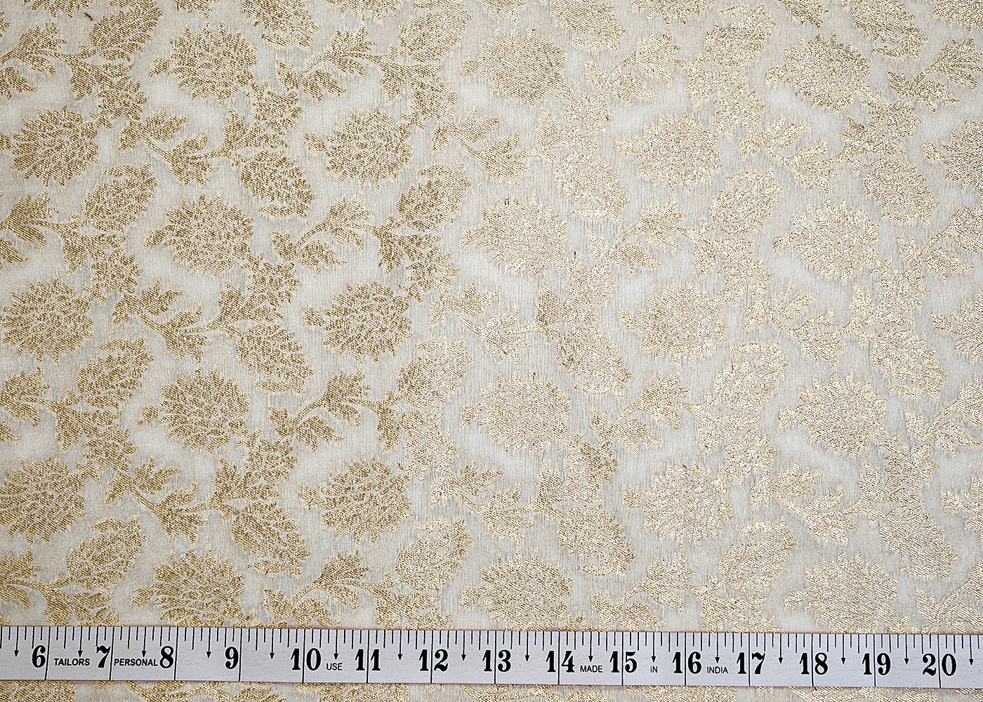 Golden Blossom Chanderi Fabric with All-Over Pattern of Golden Zari Handloom