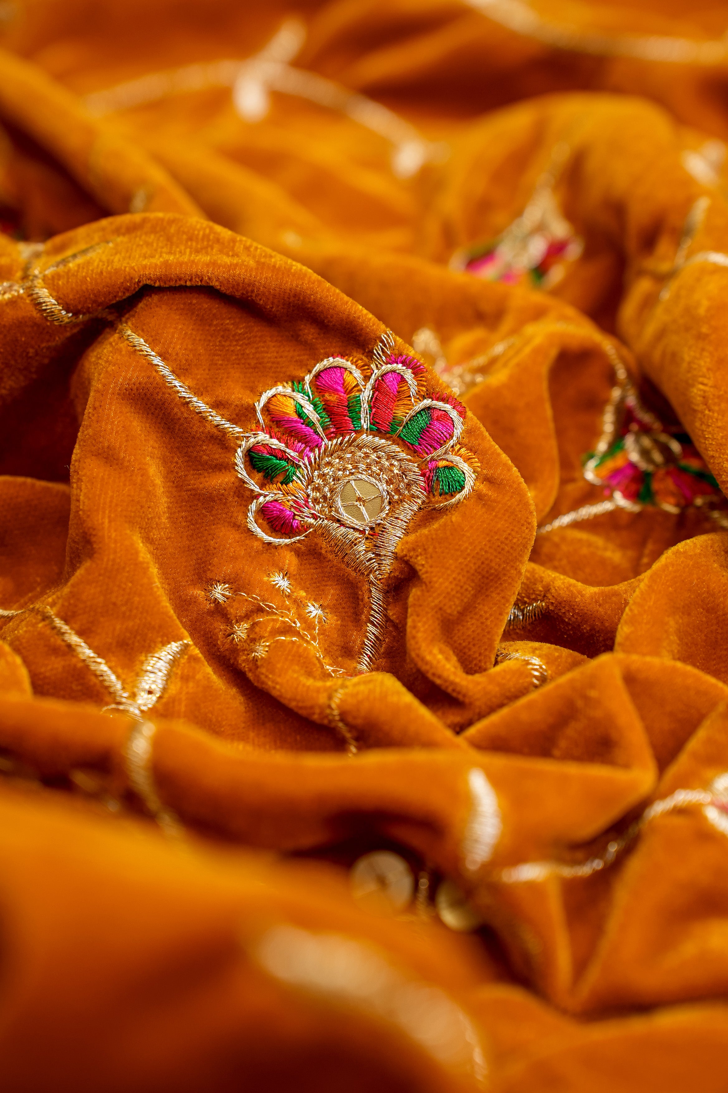 Tangerine Colored Dupatta with Zari ,Sequins and Multicolor Threadwork with Border