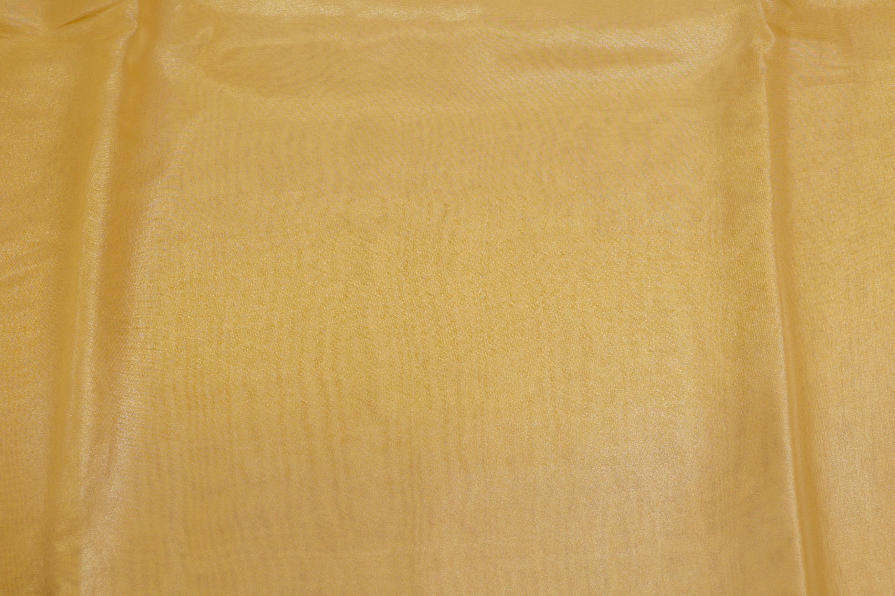 Gold coloured glass oraganza fabric