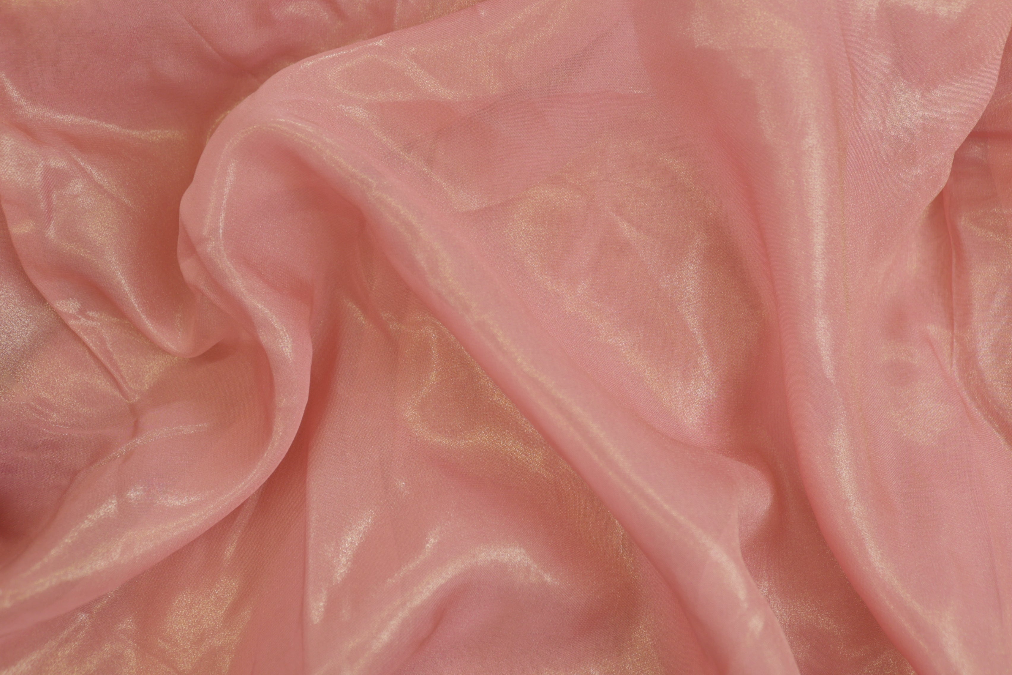 Peachy pink coloured glass oraganza fabric