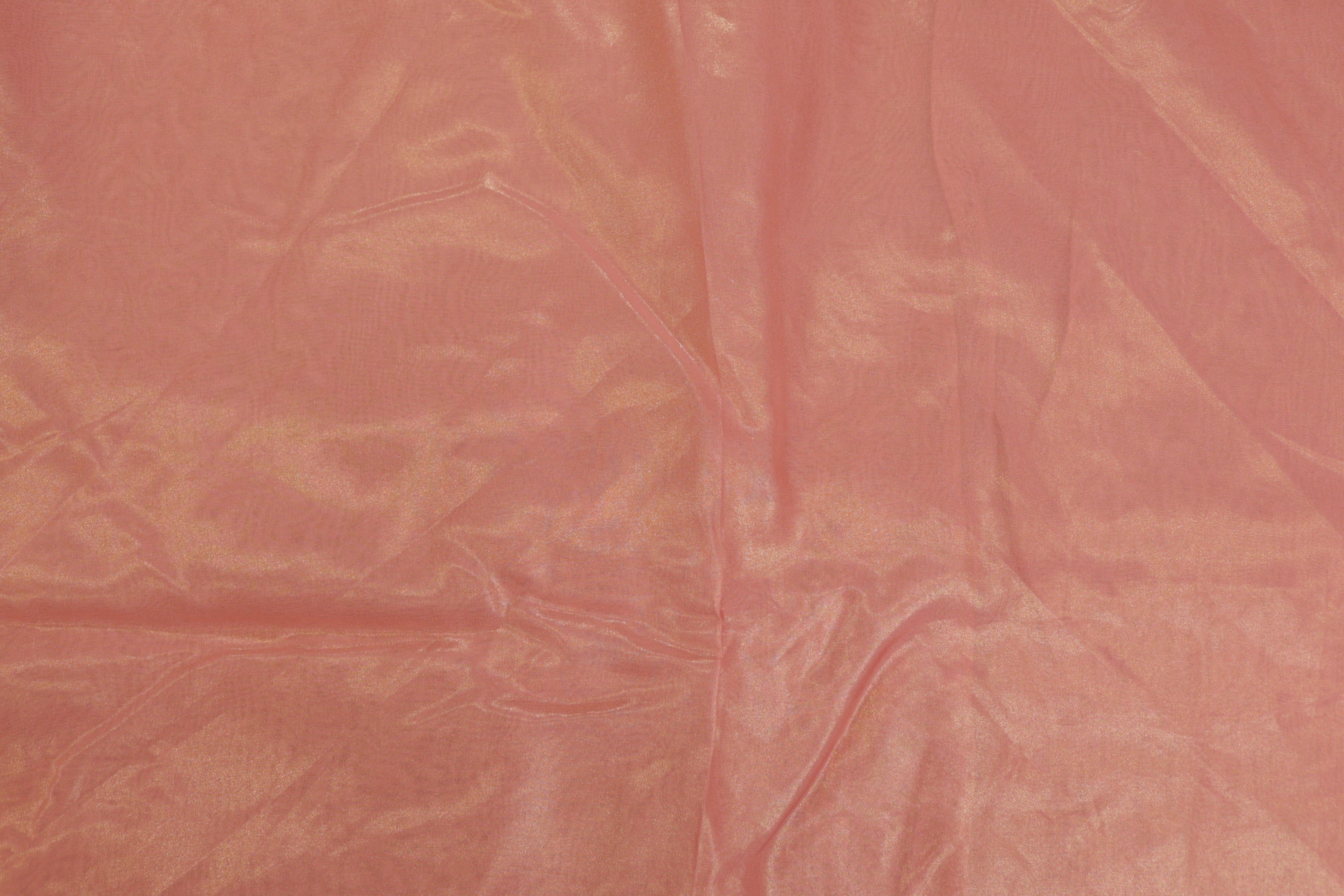 Peachy pink coloured glass oraganza fabric