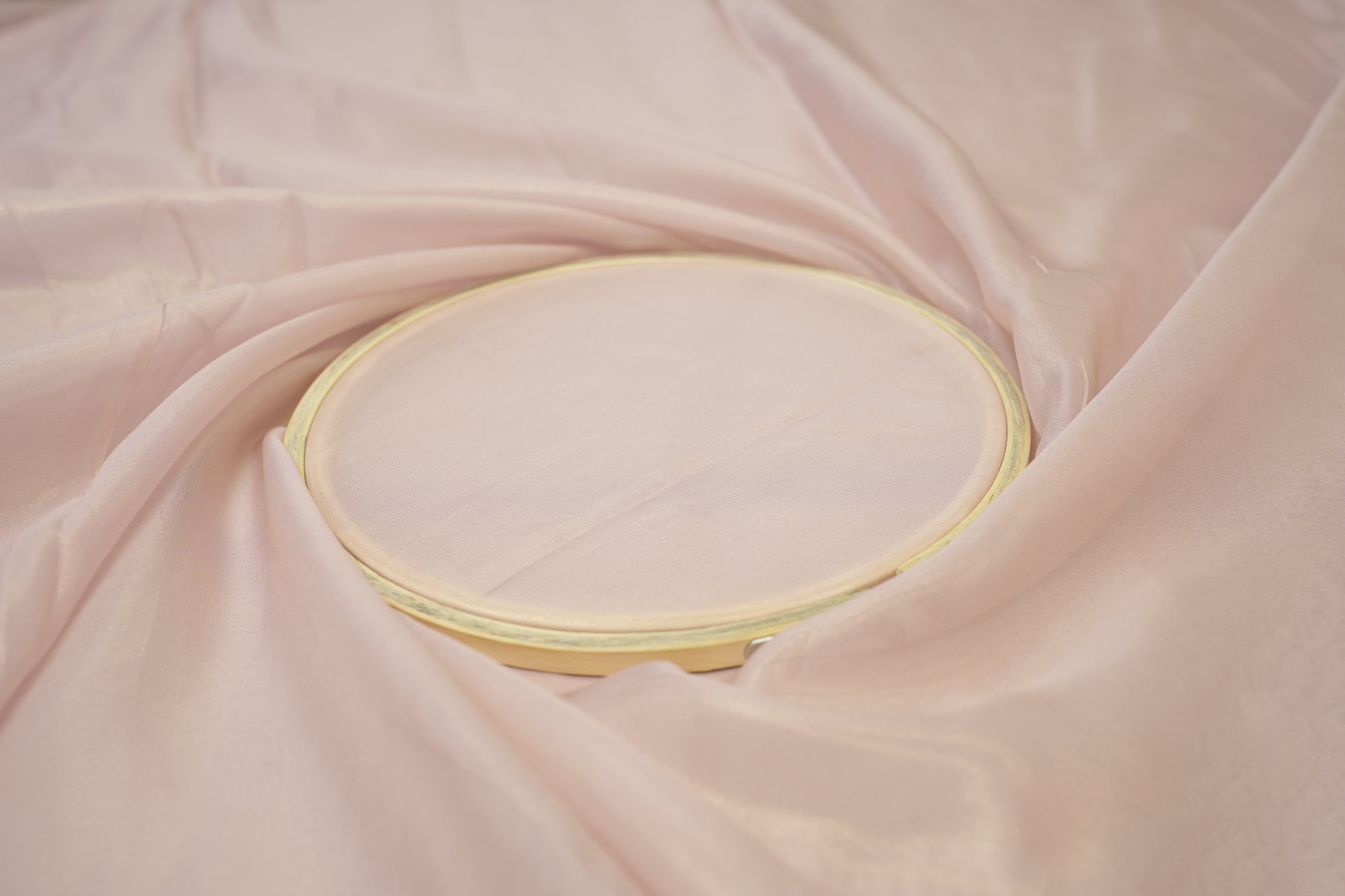 Dusty baby pink coloured glass oraganza fabric