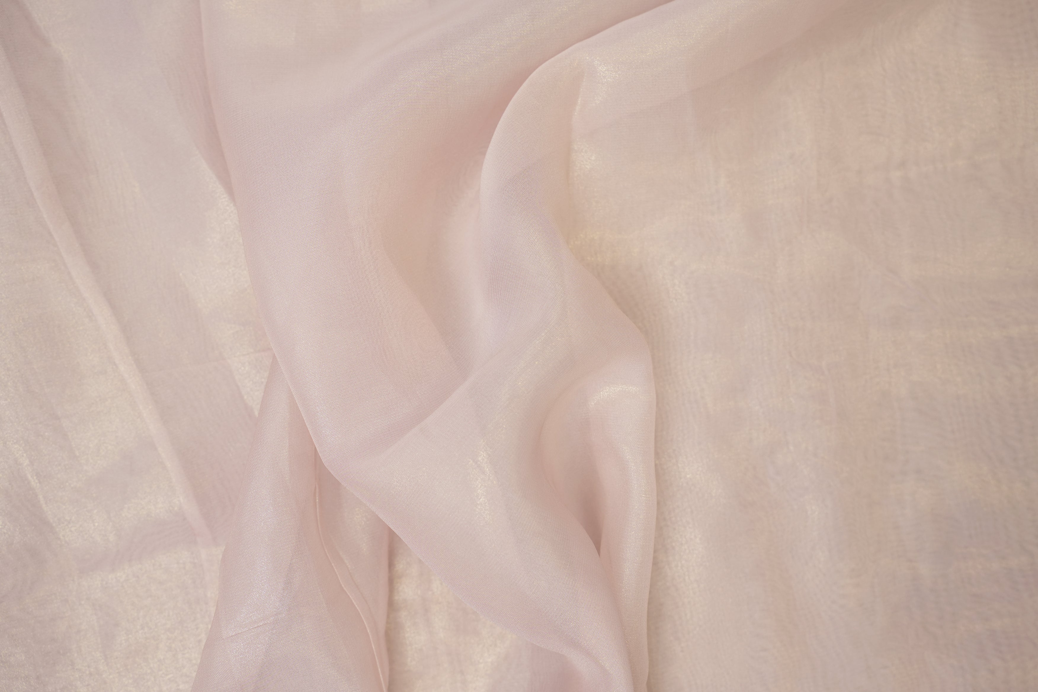 Dusty baby pink coloured glass oraganza fabric