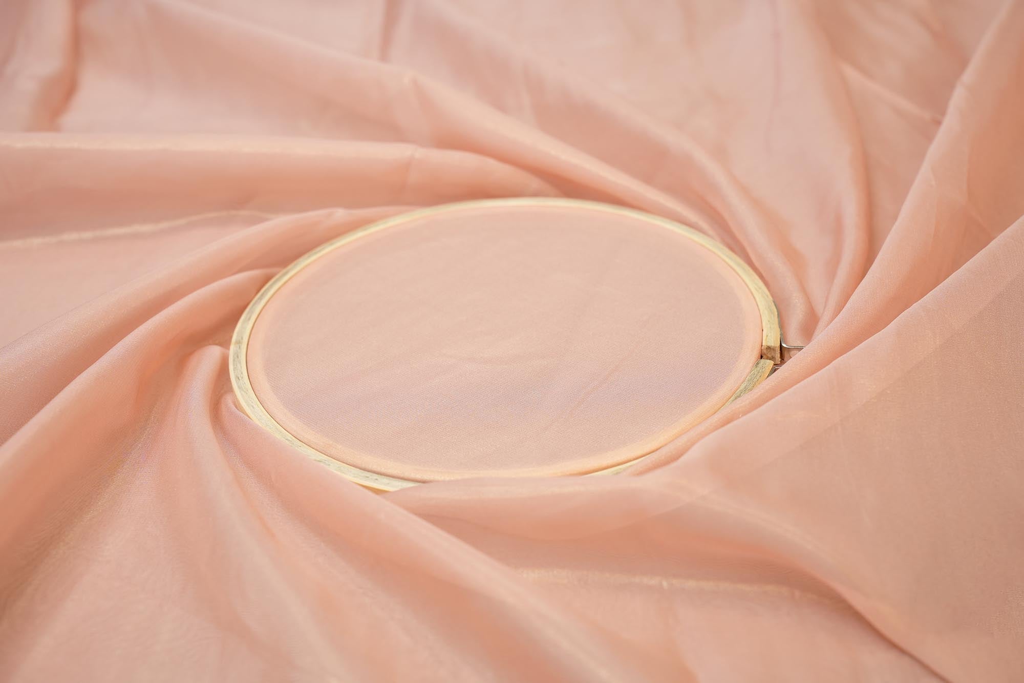 Light pink coloured glass oraganza fabric