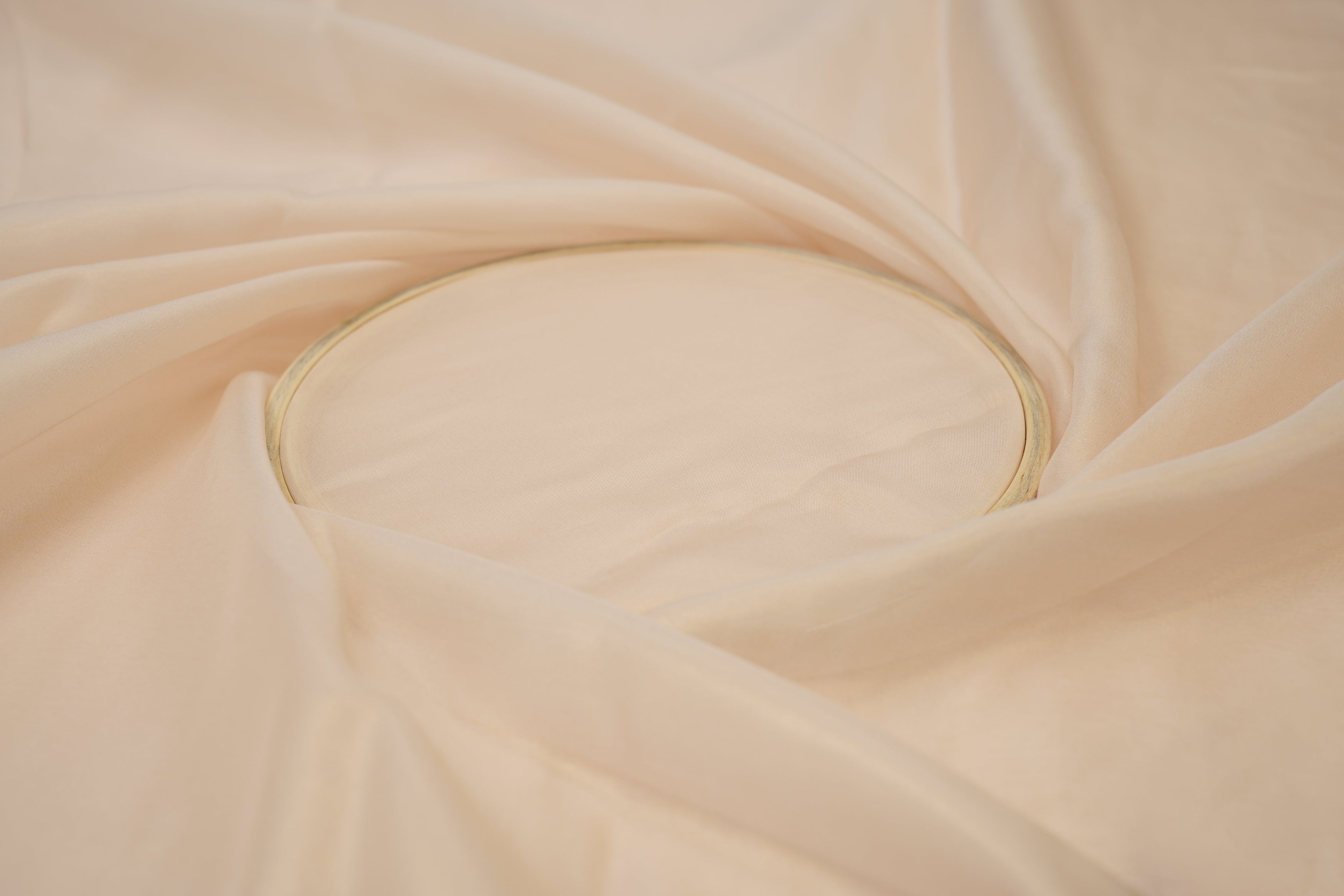 Peachy nude coloured glass oraganza fabric