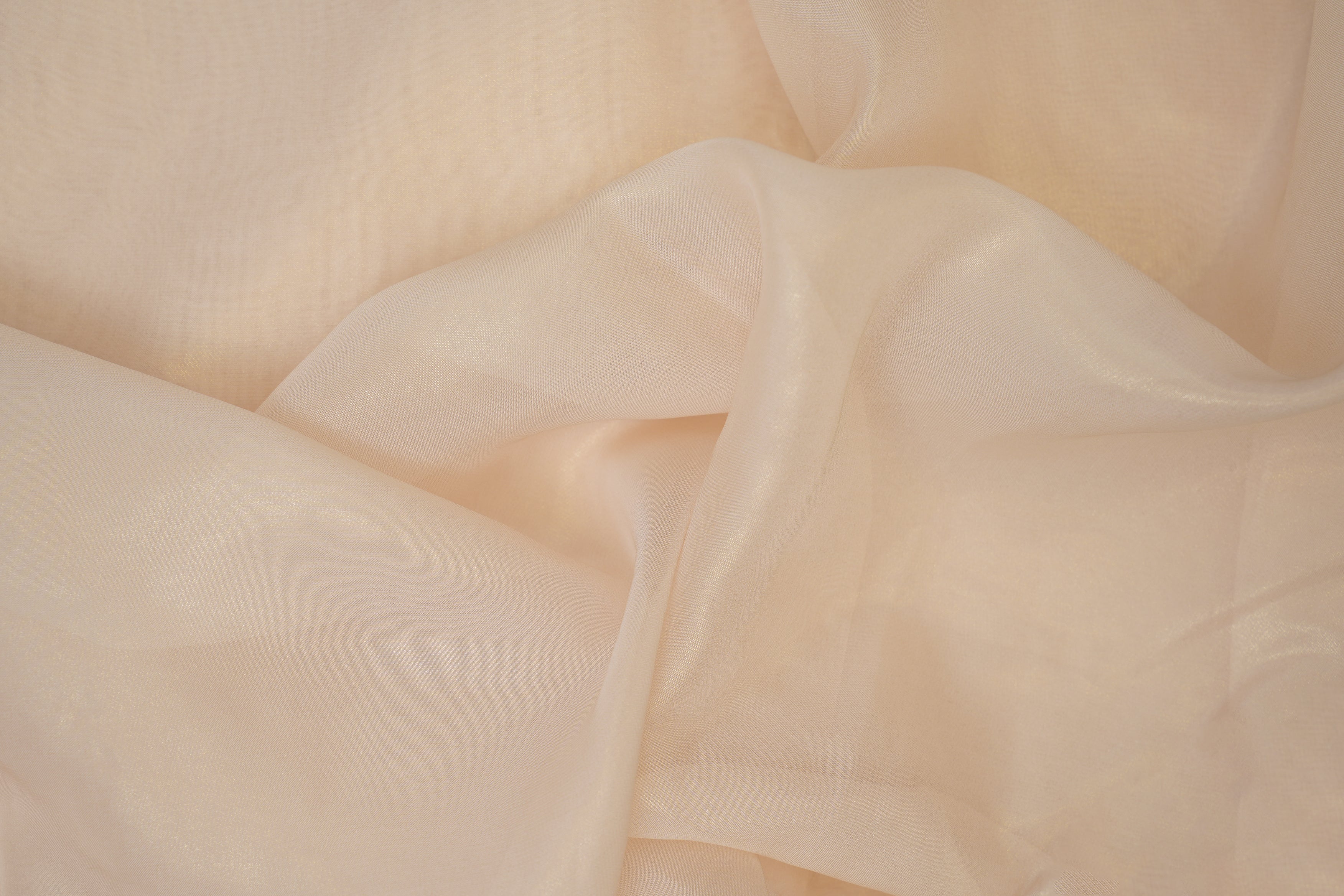 Peachy nude coloured glass oraganza fabric