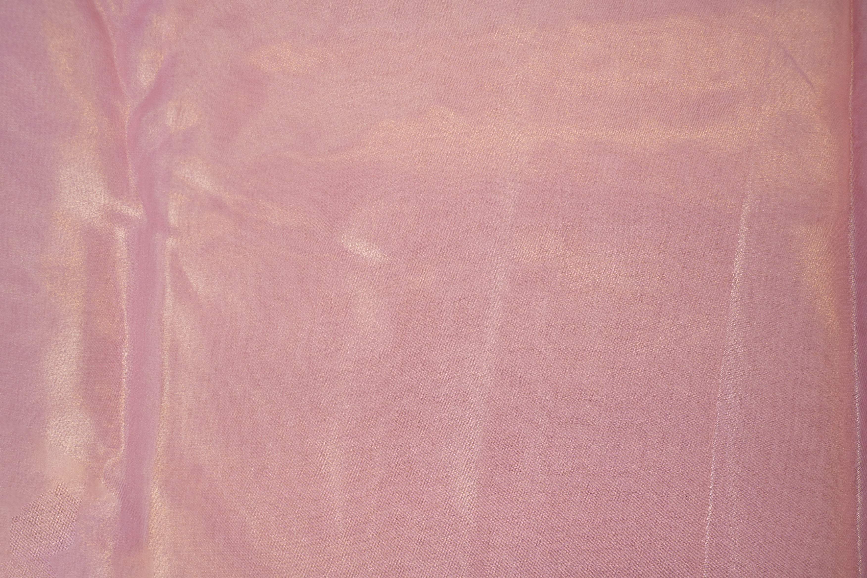 Light pink coloured glass oraganza fabric