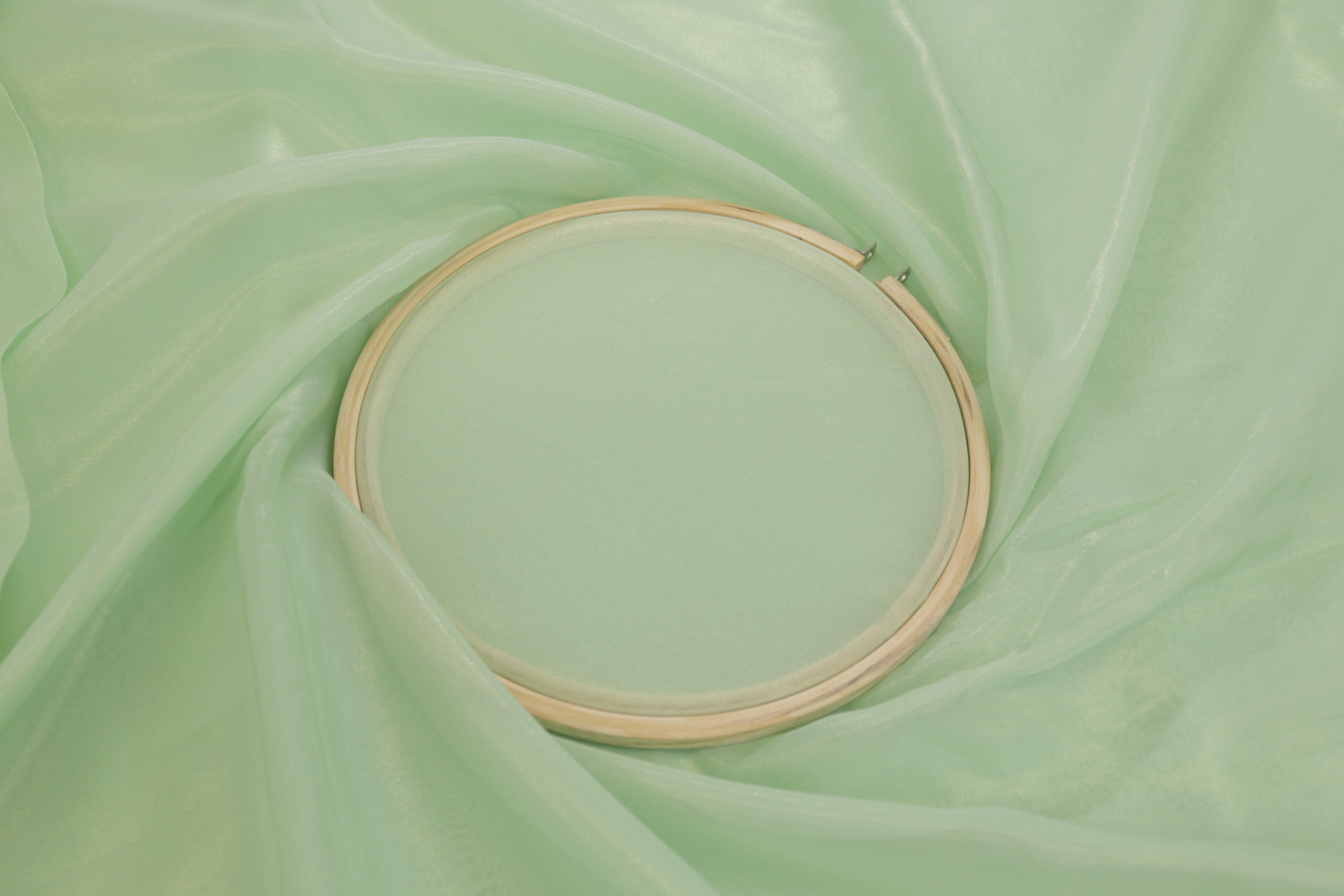 Pastel green coloured glass oraganza fabric