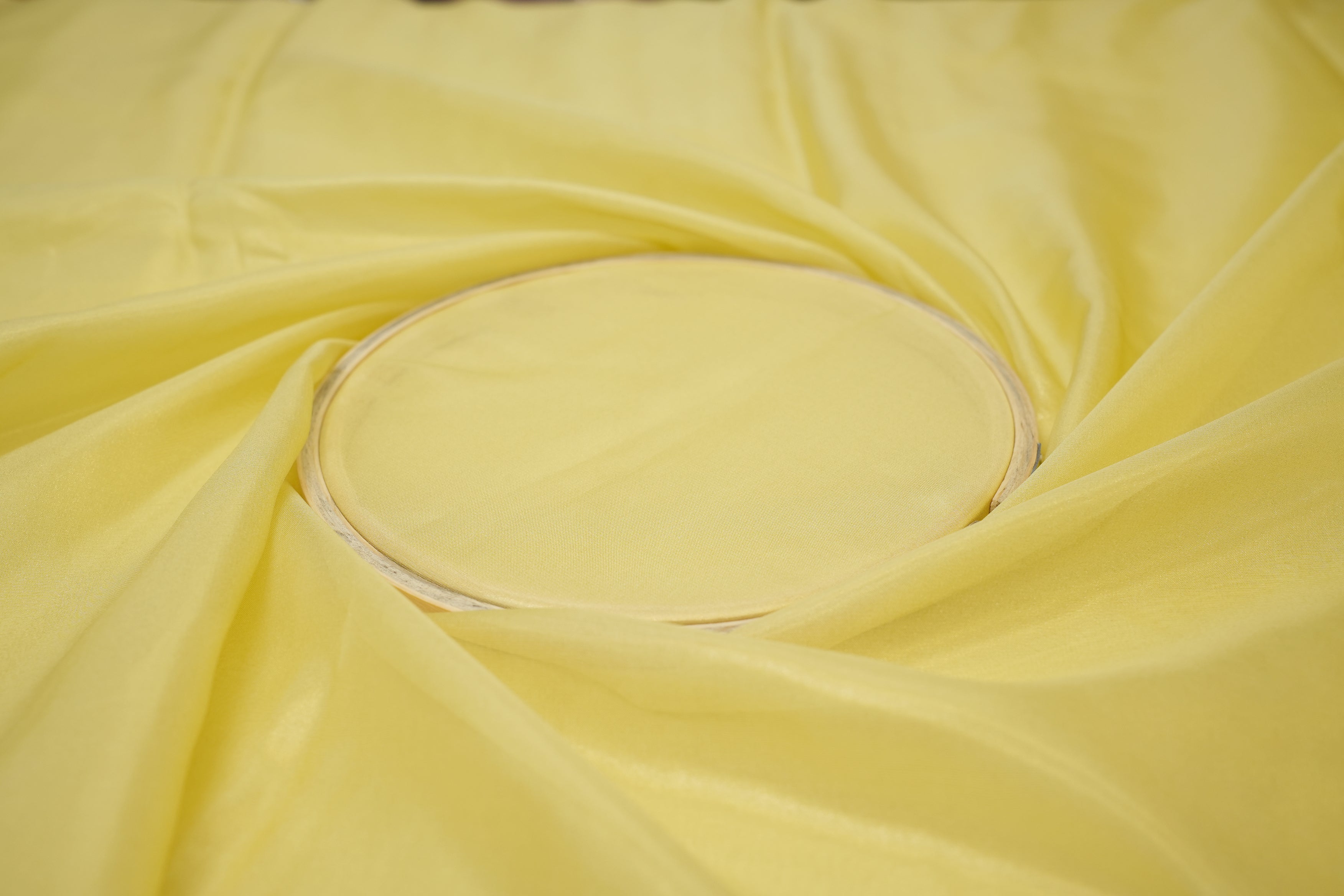 Yellow coloured glass oraganza fabric