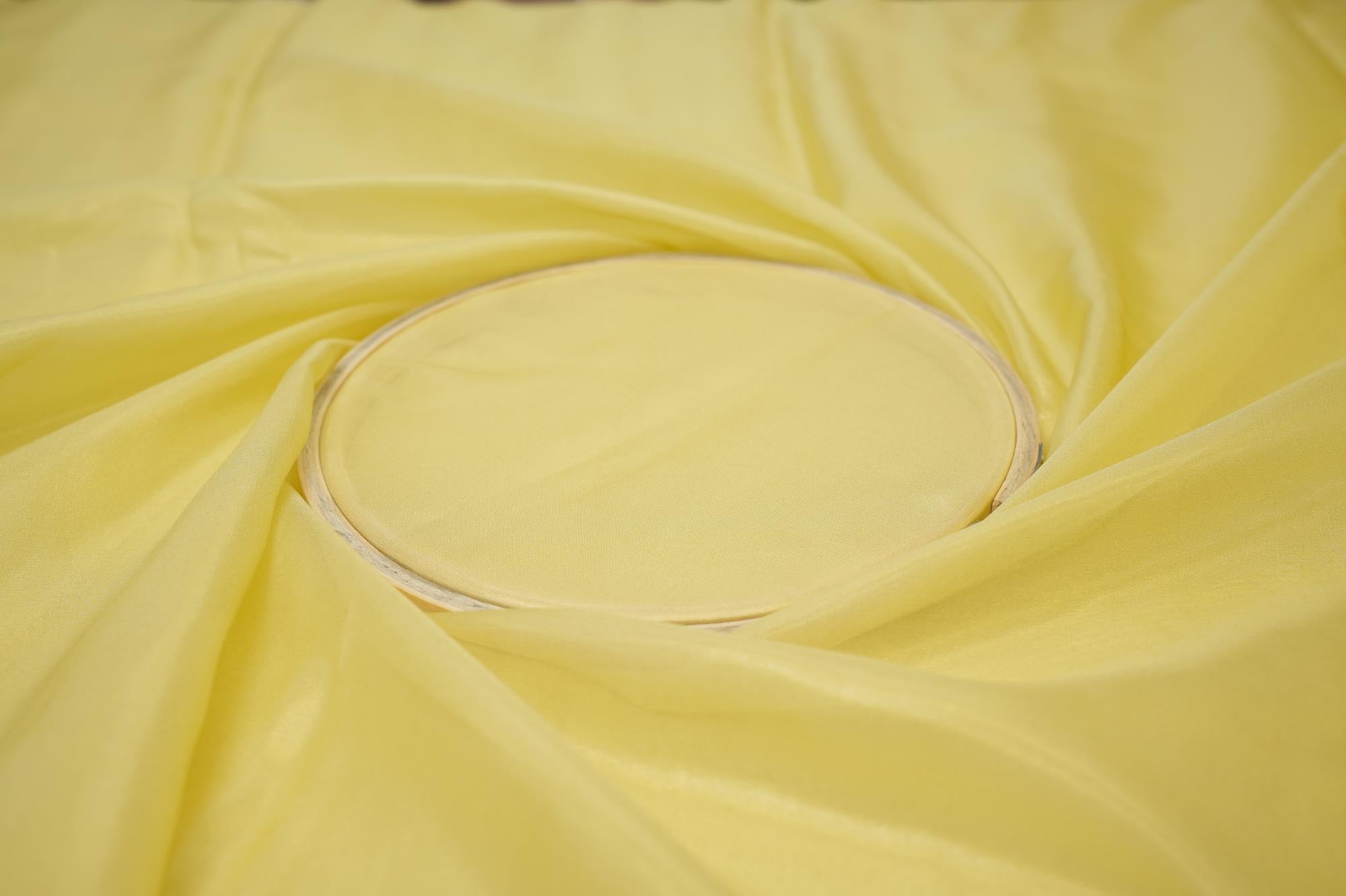 Yellow coloured glass oraganza fabric