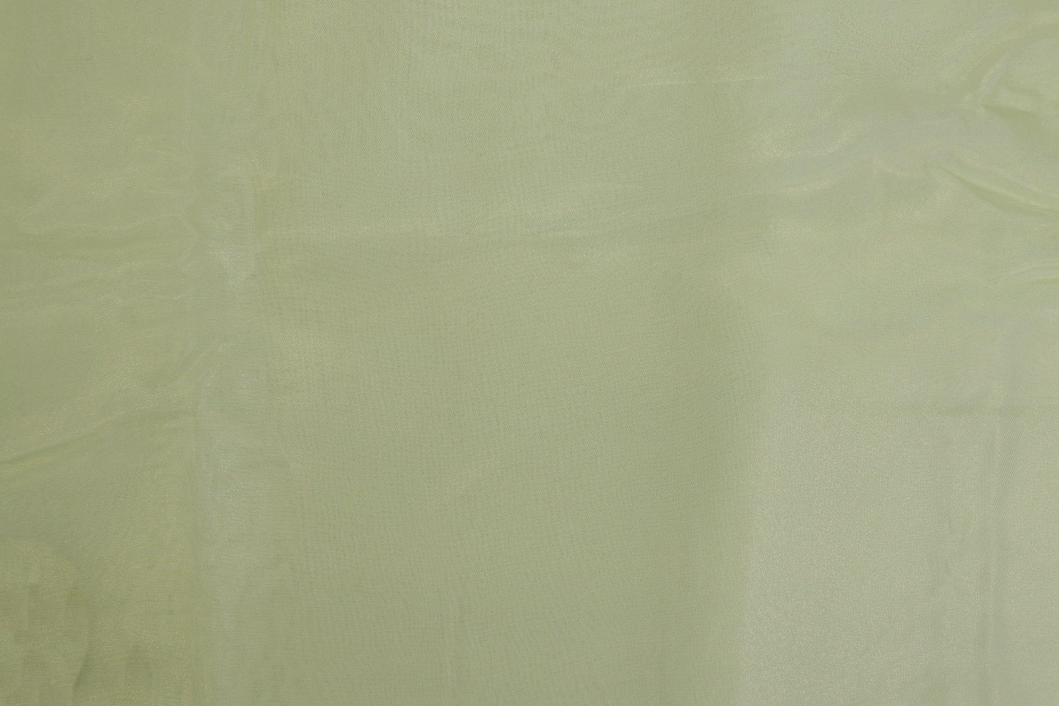 Light mint green coloured glass oraganza fabric