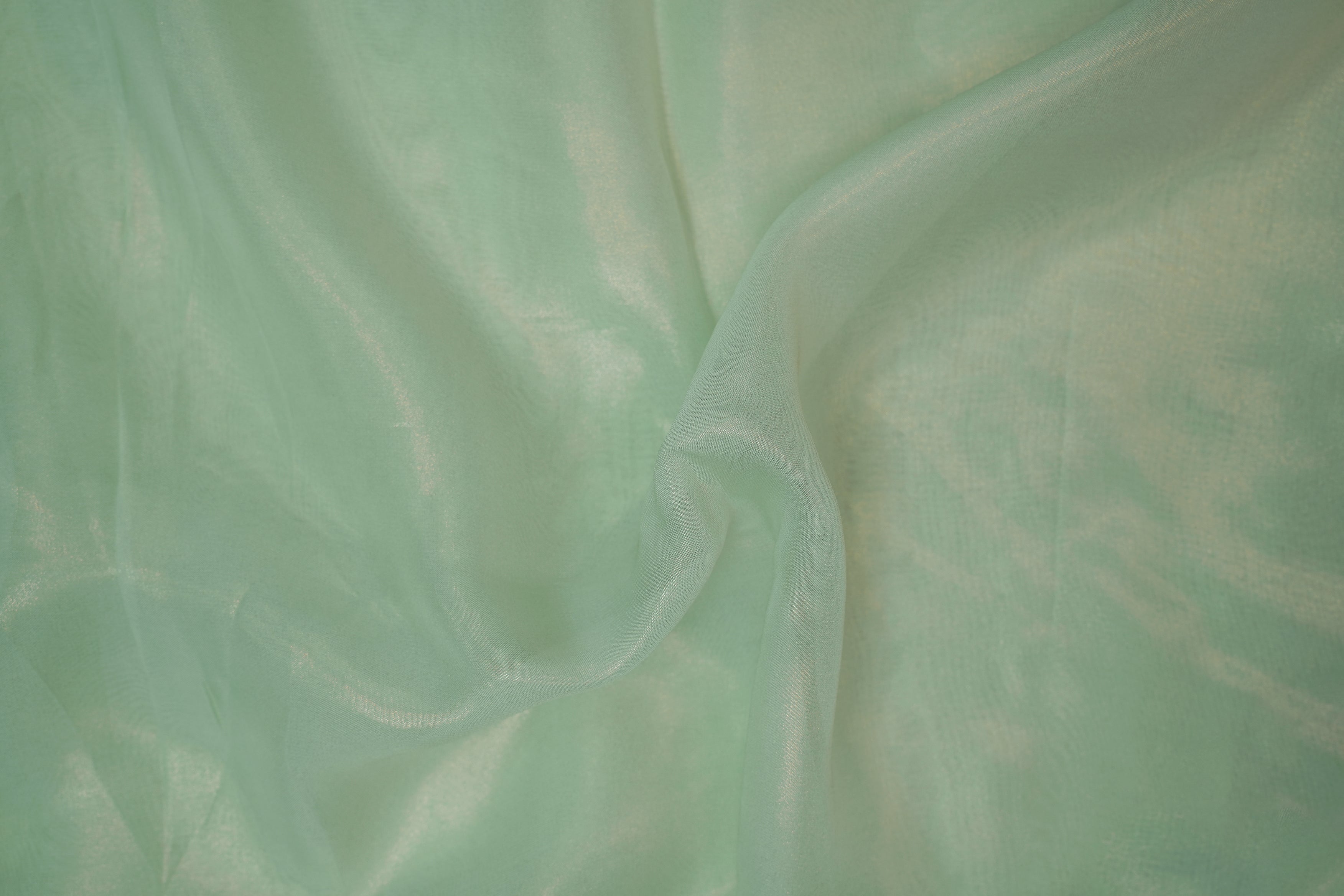 Sea green coloured glass oraganza fabric