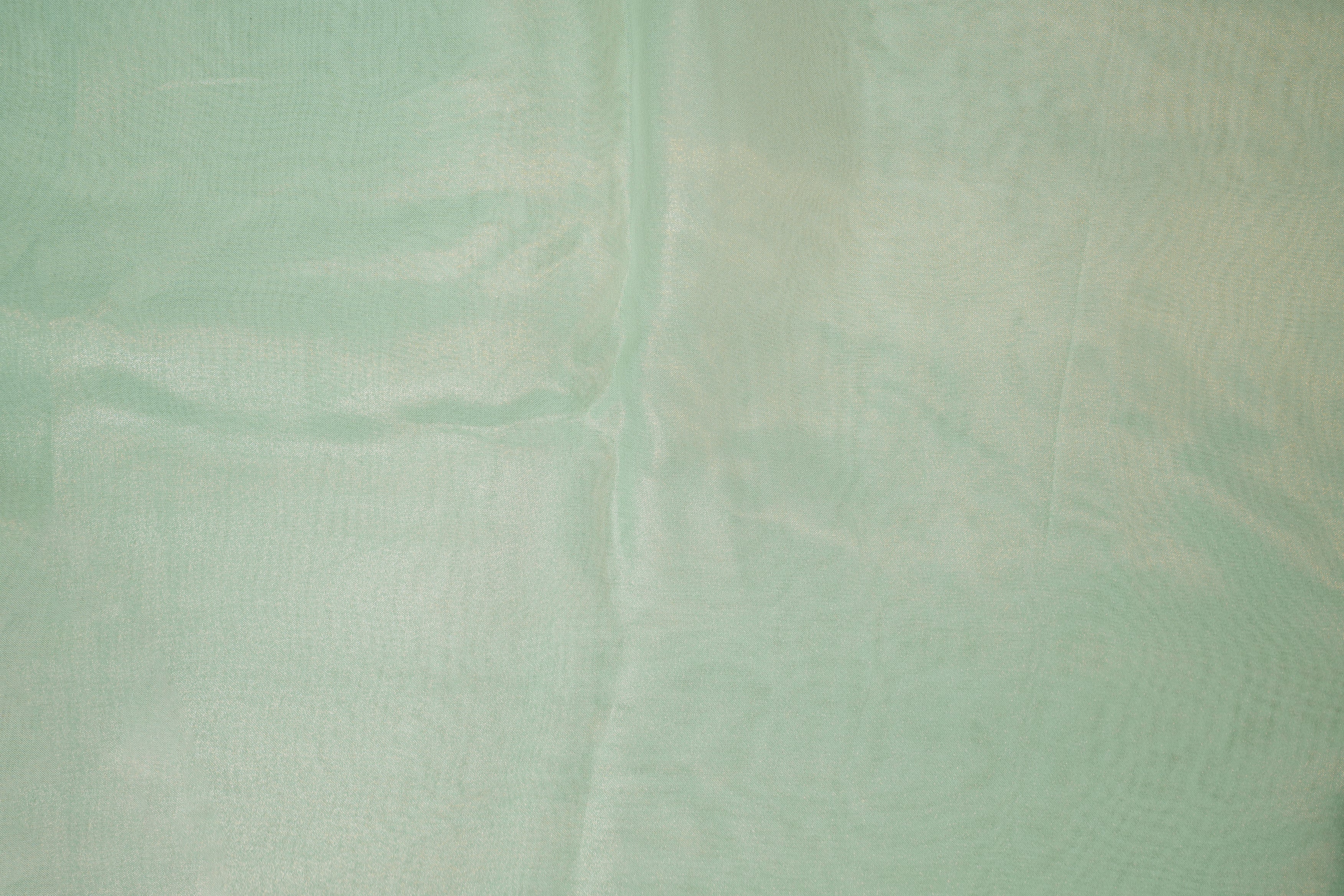 Sea green coloured glass oraganza fabric