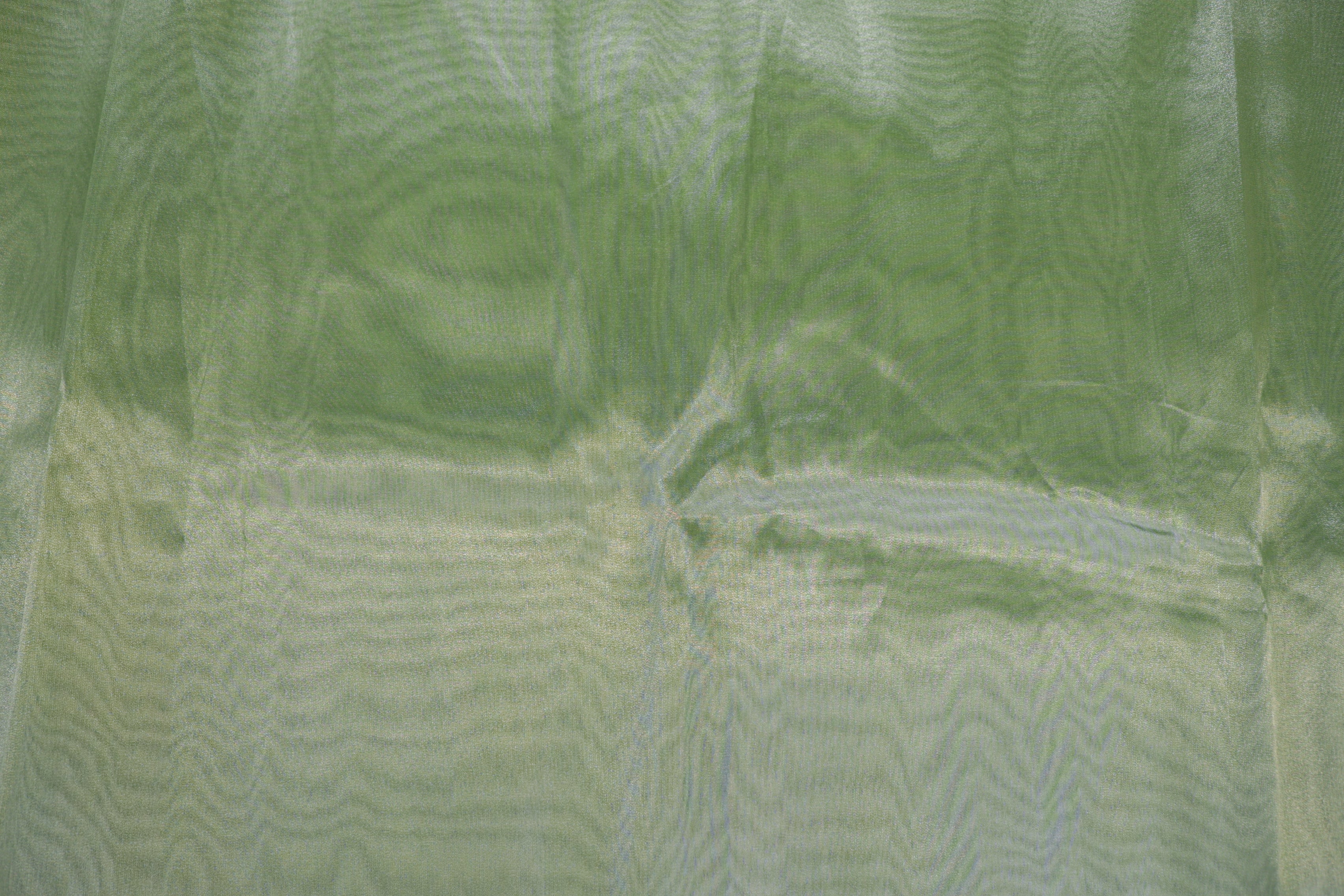 Parrot green coloured tissue fabric with silver shimmer