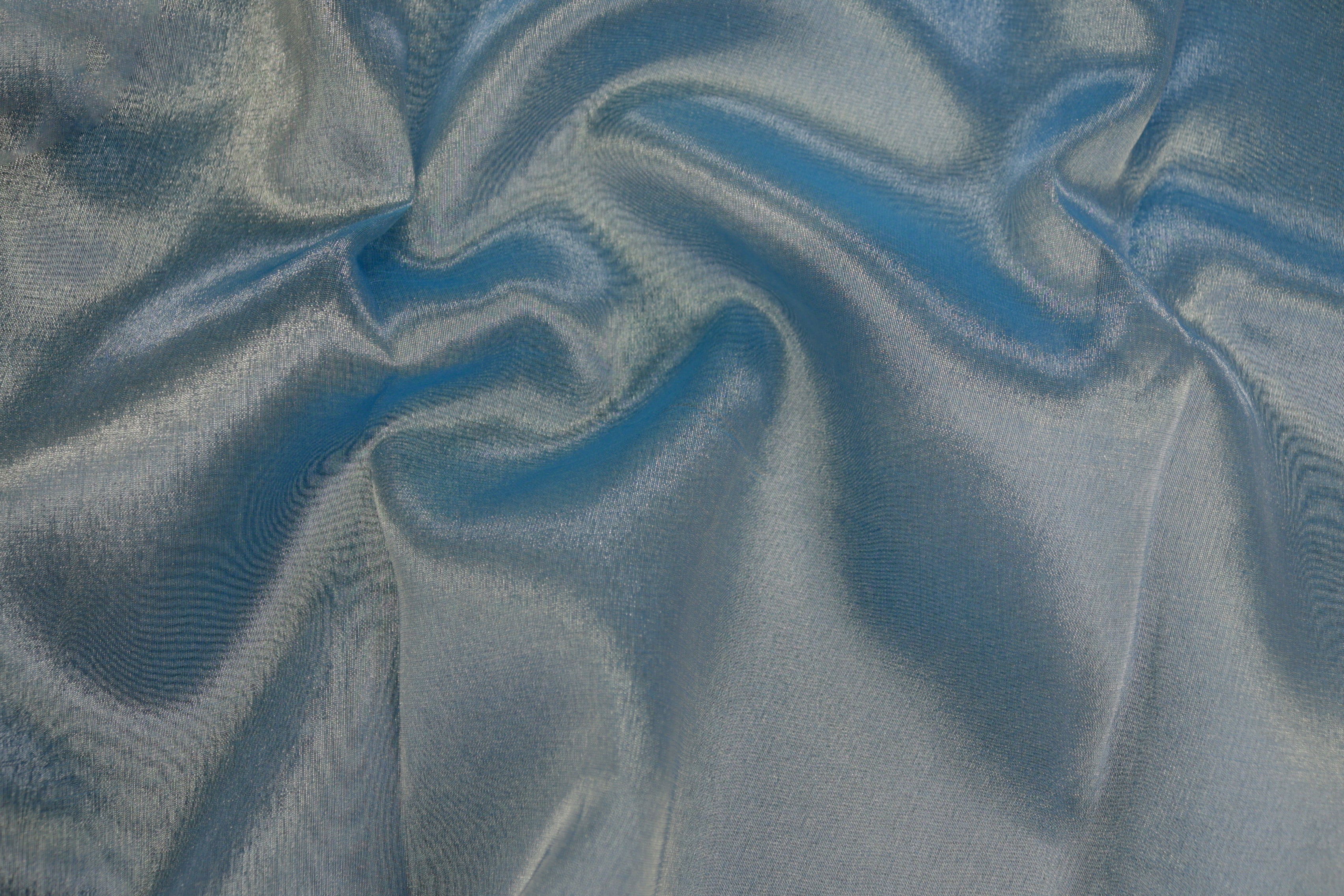 Firozi coloured tissue fabric with silver shimmer