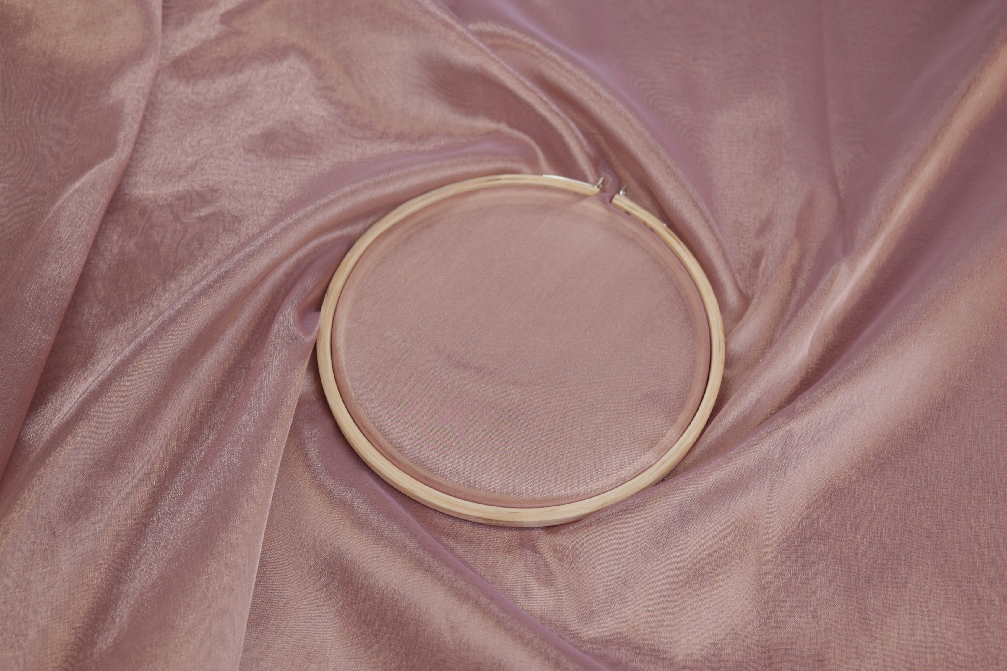 Light onion coloured tissue fabric with gold shimmer