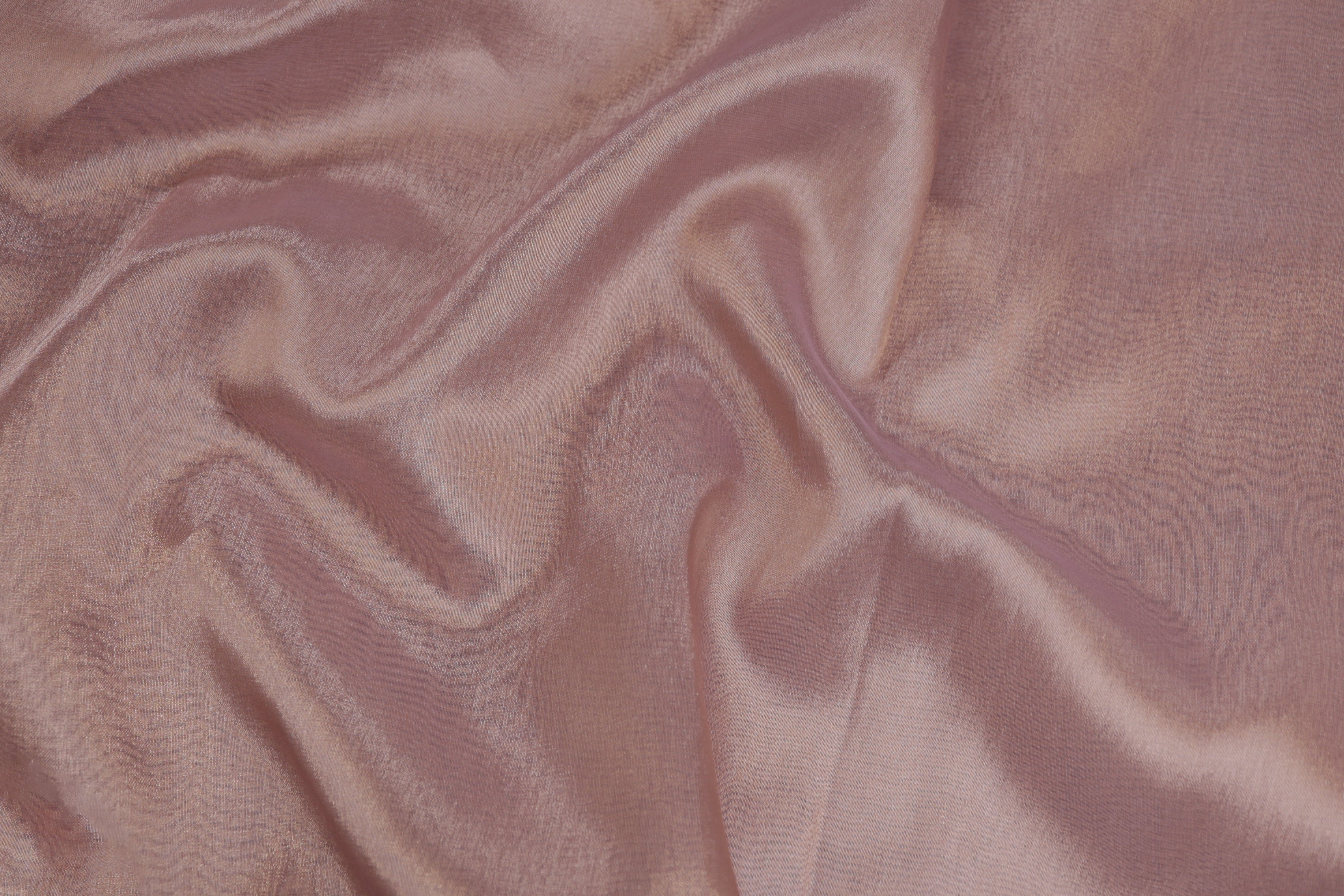 Light onion coloured tissue fabric with gold shimmer