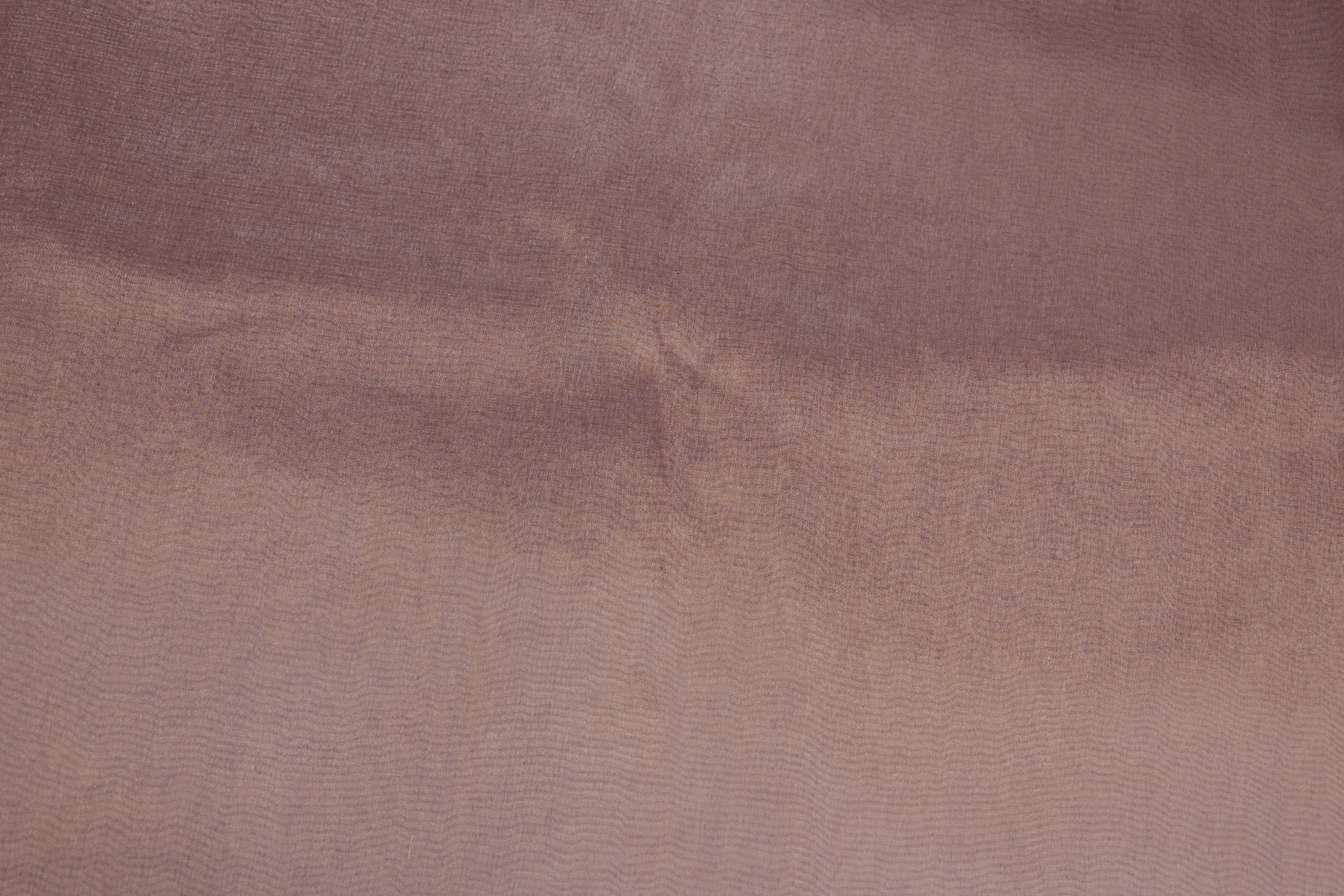 Light onion coloured tissue fabric with gold shimmer