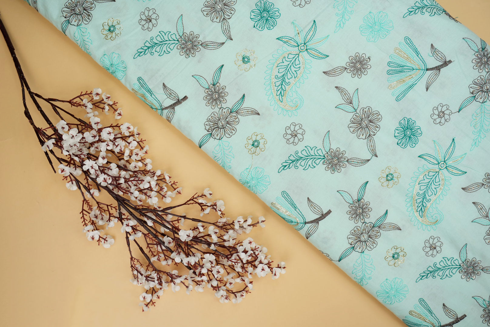 Light teal Floral patten  with threadwork  all over on cotton fabric