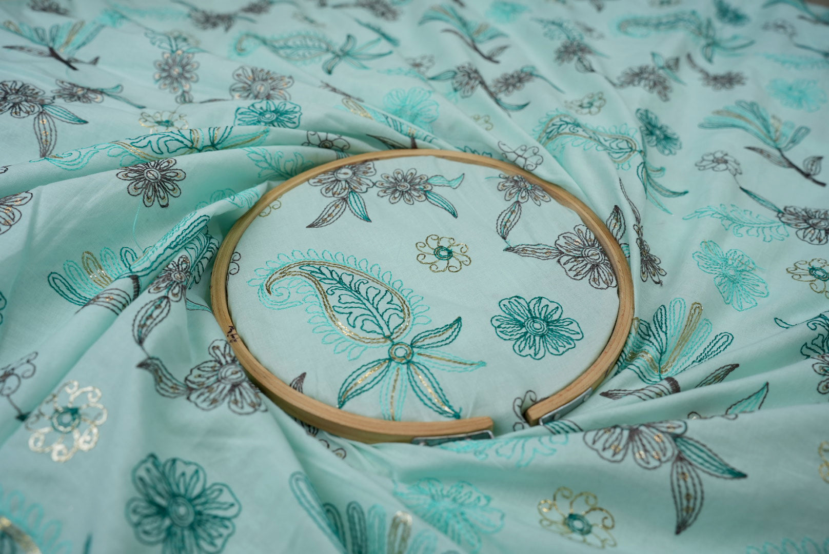 Light teal Floral patten  with threadwork  all over on cotton fabric