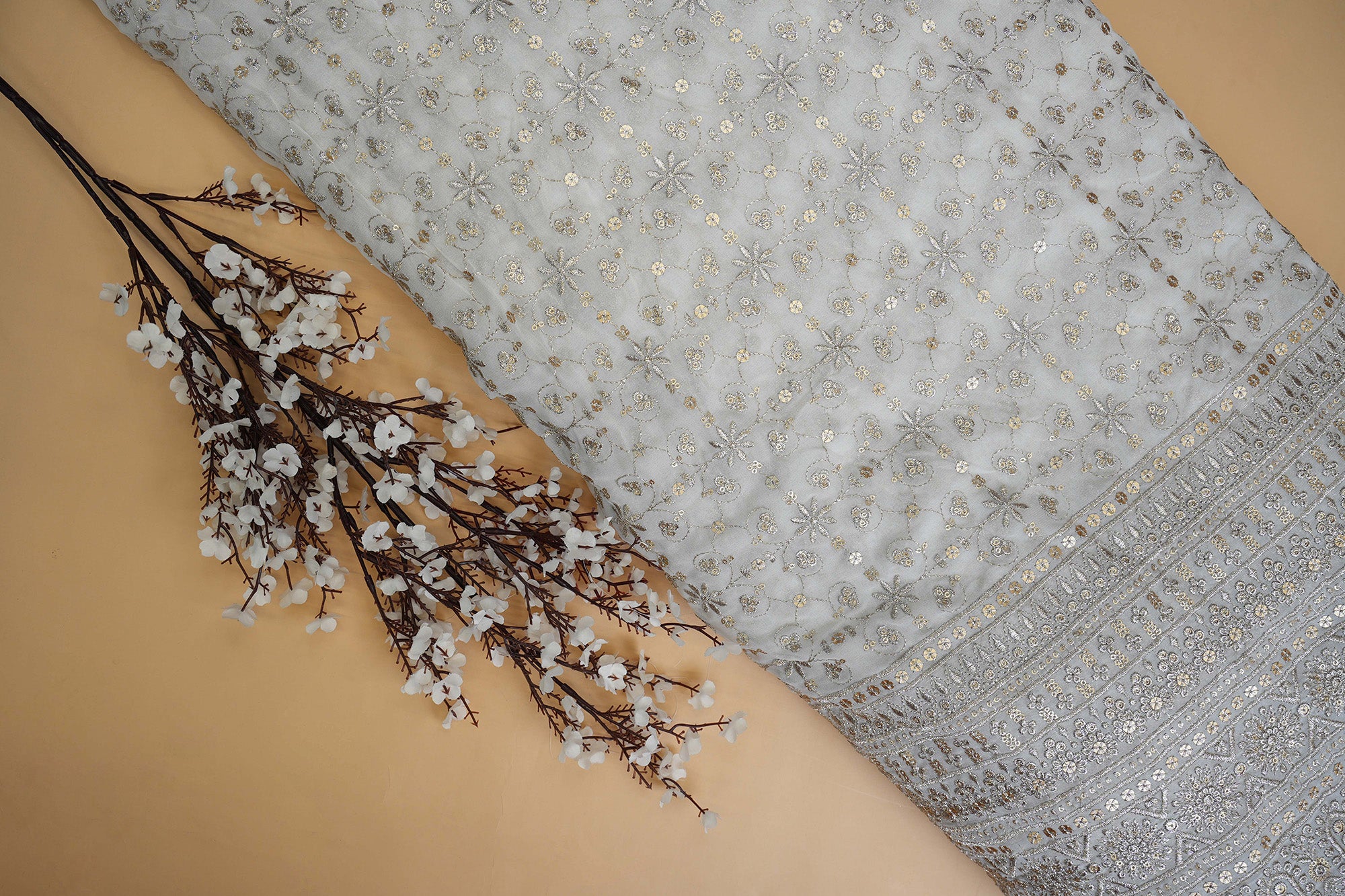 Traditional Pattern Golden Zari With Matte Sequins Embroidered Georgette Fabric With Border- Paras Gallery Fabrics