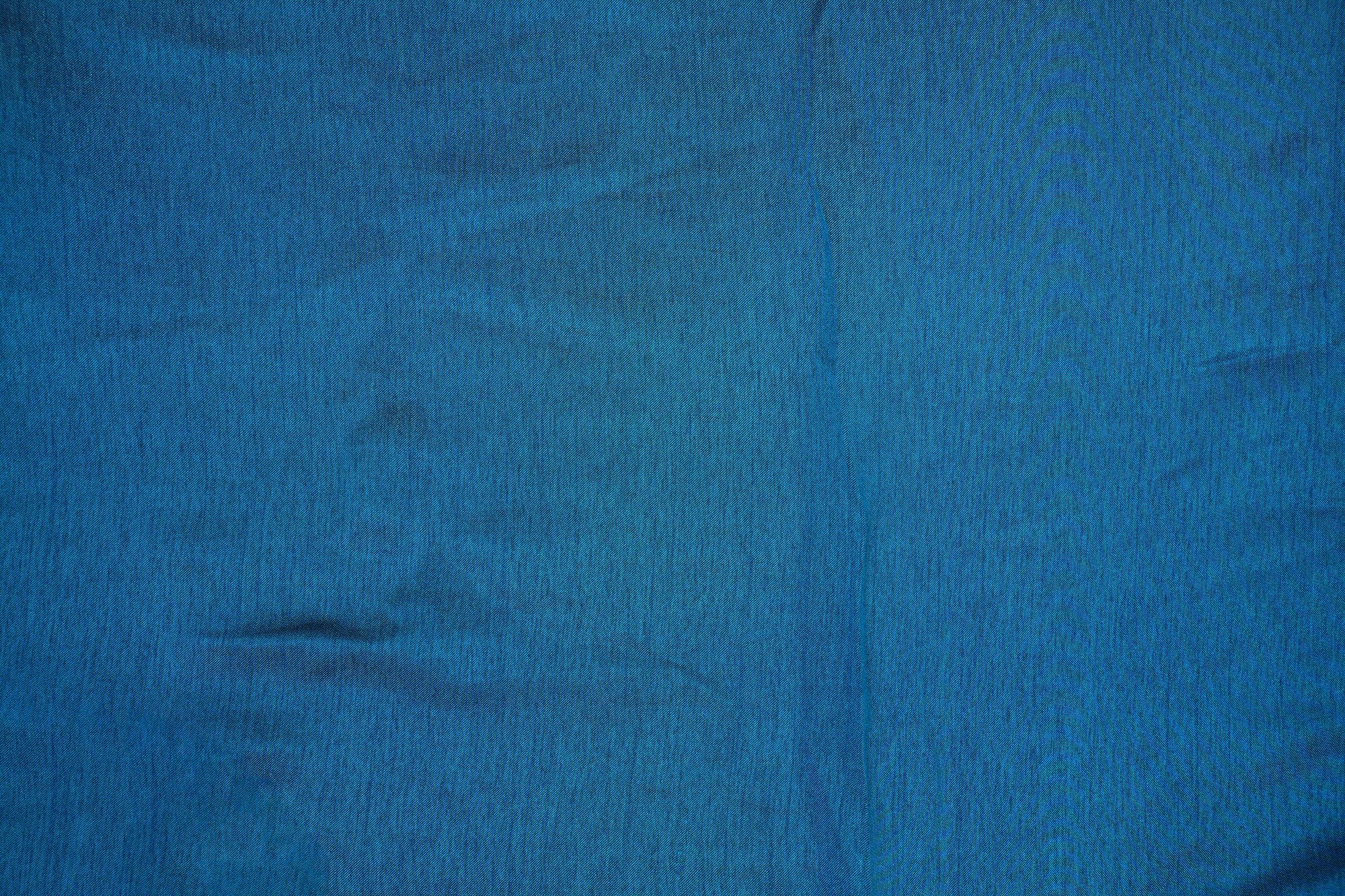 Teal blue coloured barfi silk fabric