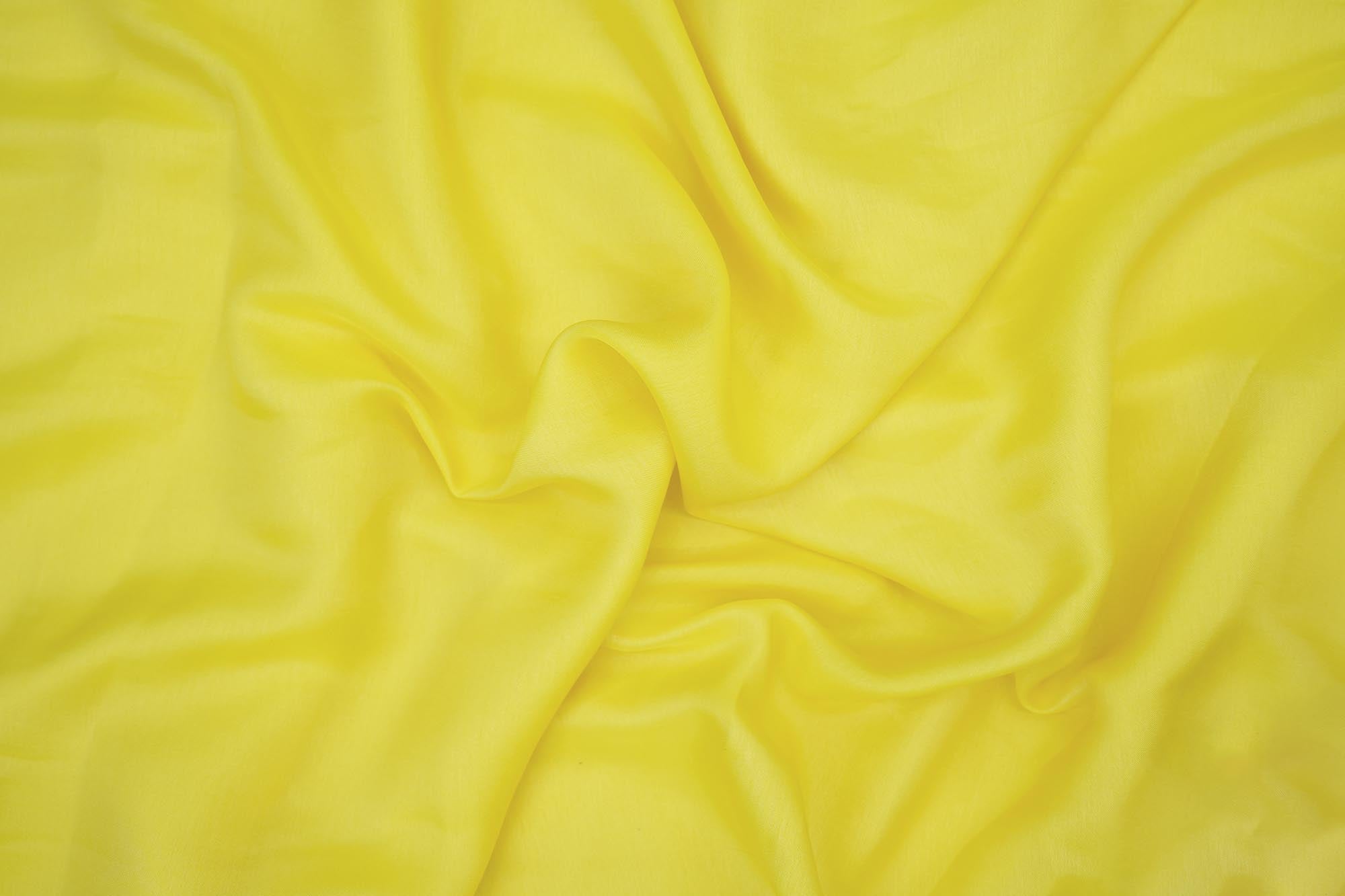 Neon yellow coloured barfi silk fabric