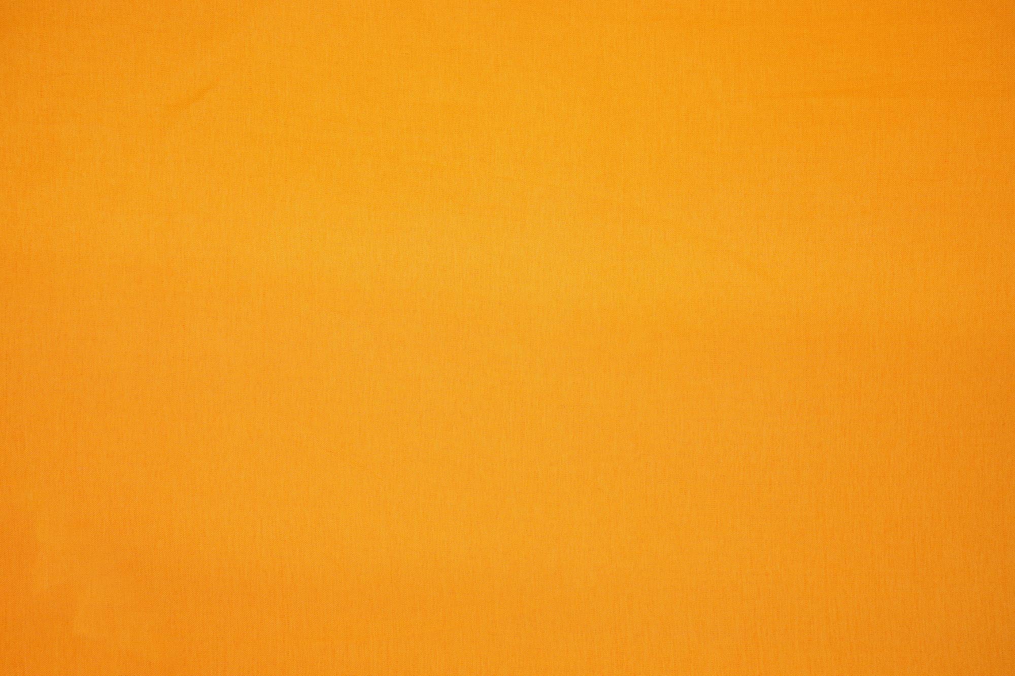 Orange coloured barfi silk fabric