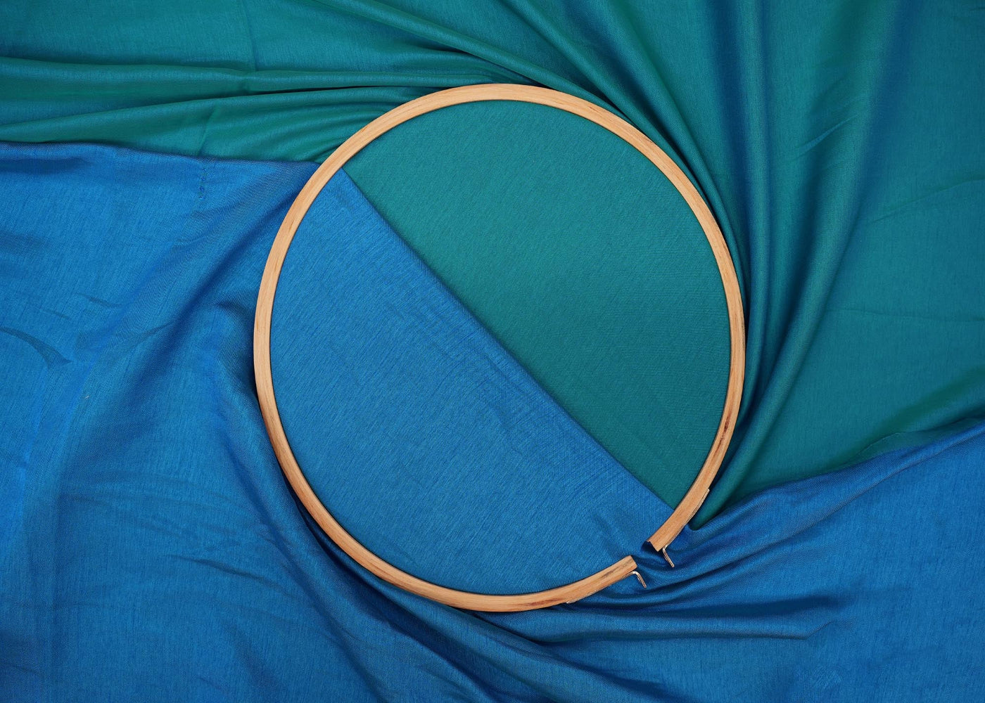 Turquiose coloured barfi silk fabric