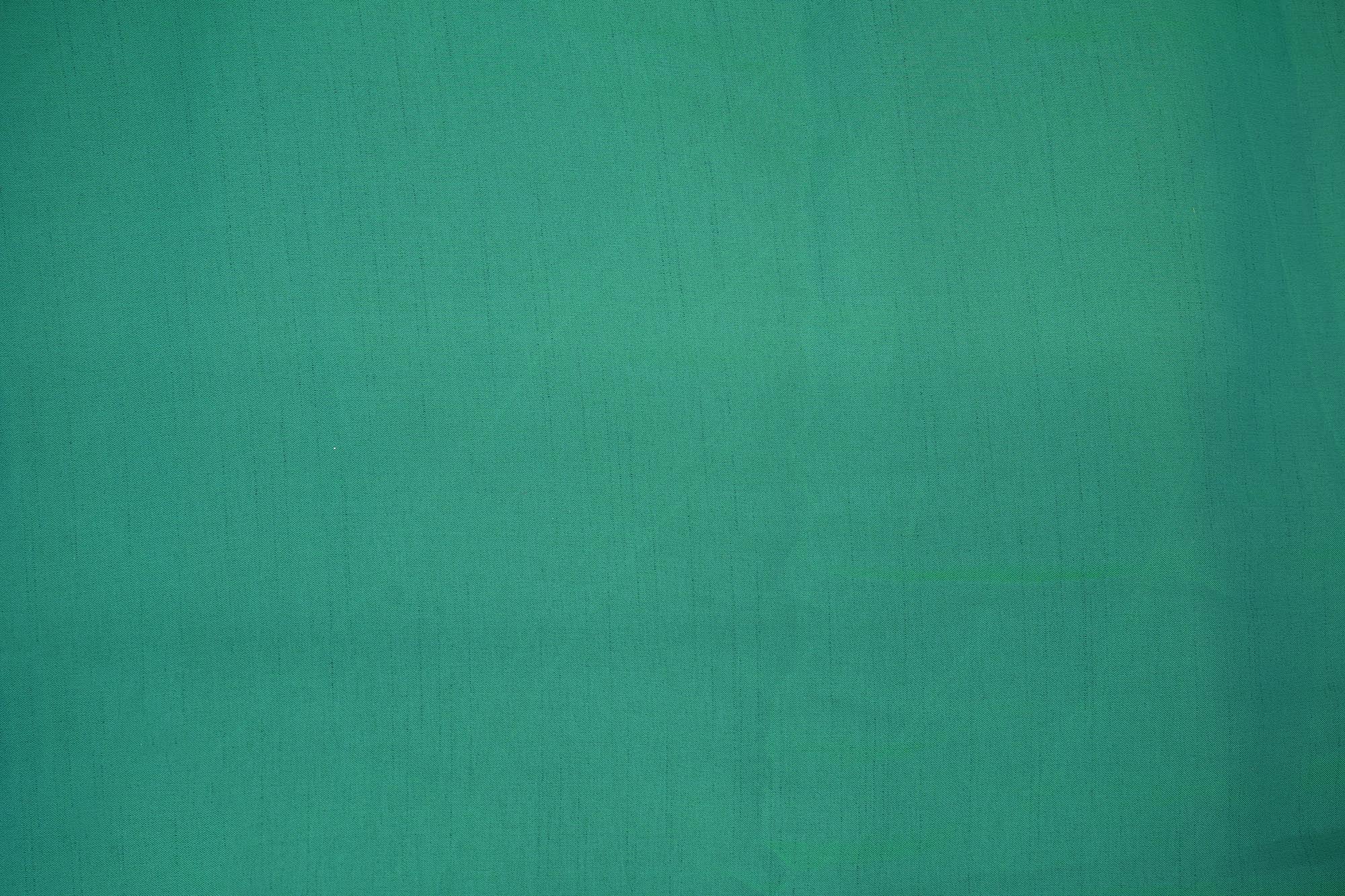 Emerald green coloured barfi silk fabric