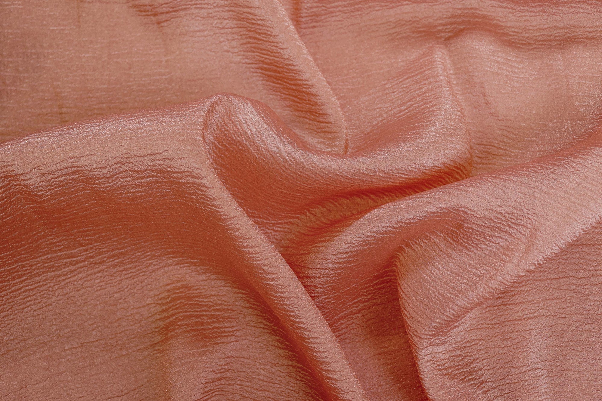 Rose gold coloured crushed tissue organza fabric