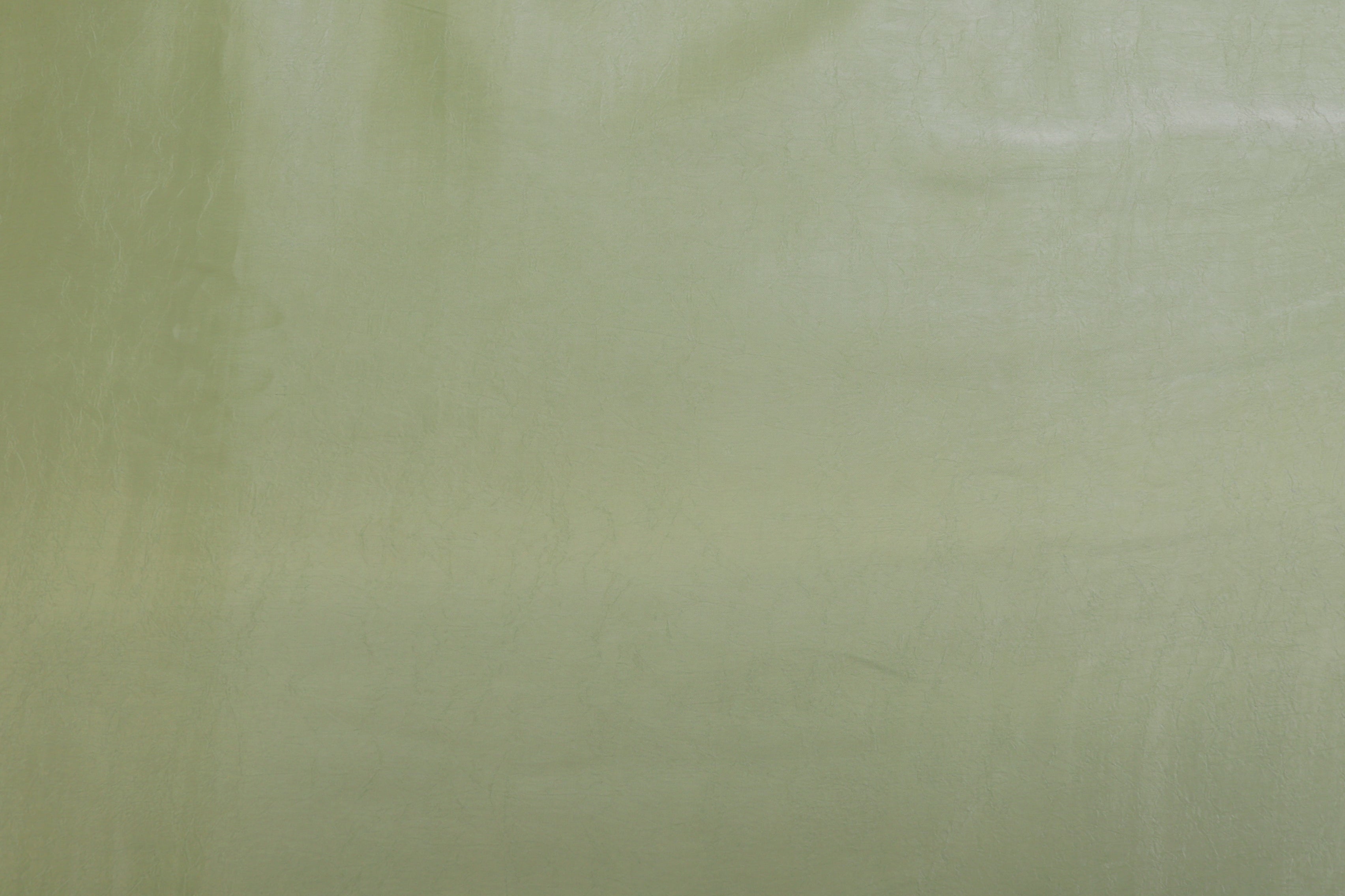 Pista green coloured silk crushed texture fabric