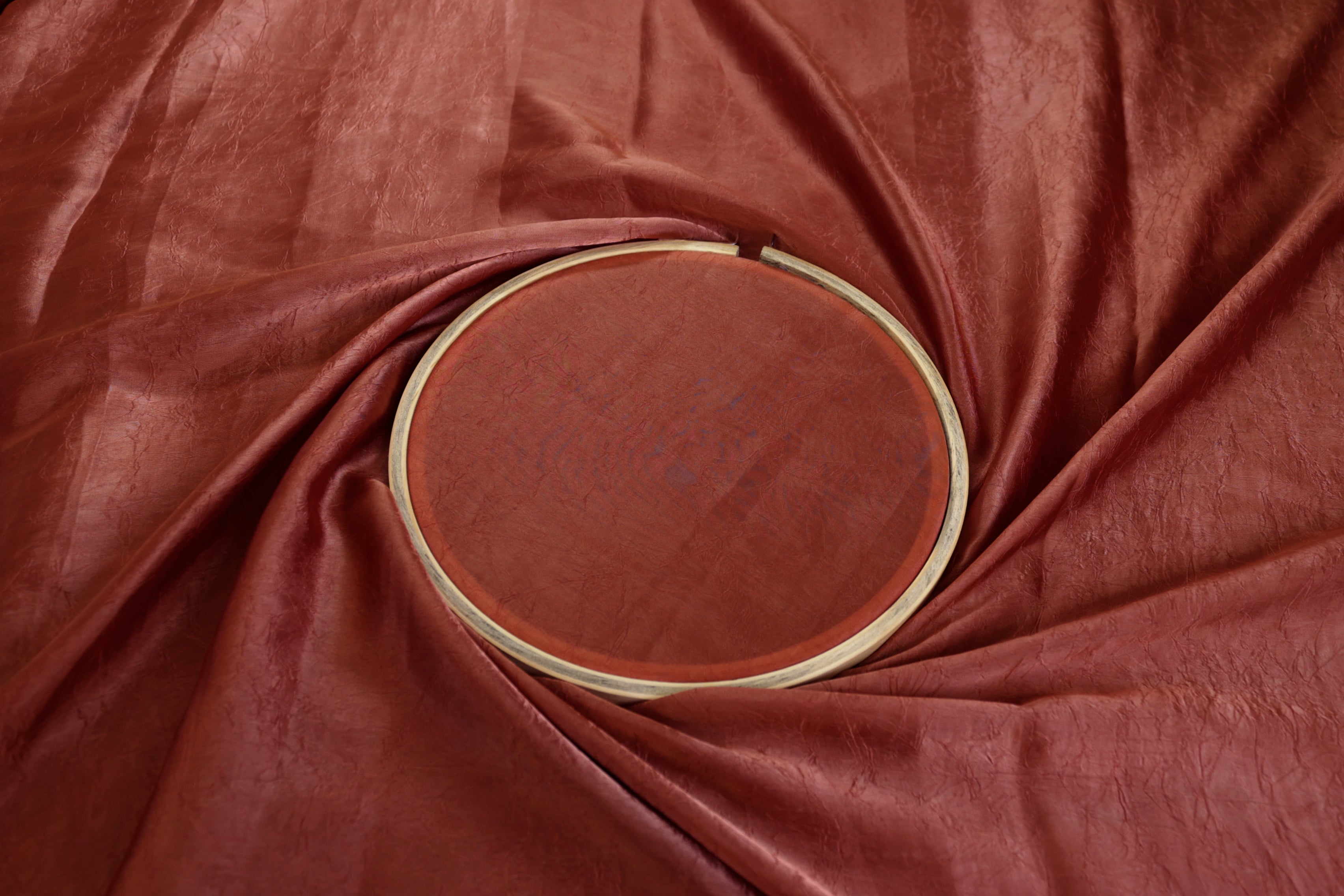 Rust coloured silk crushed texture fabric