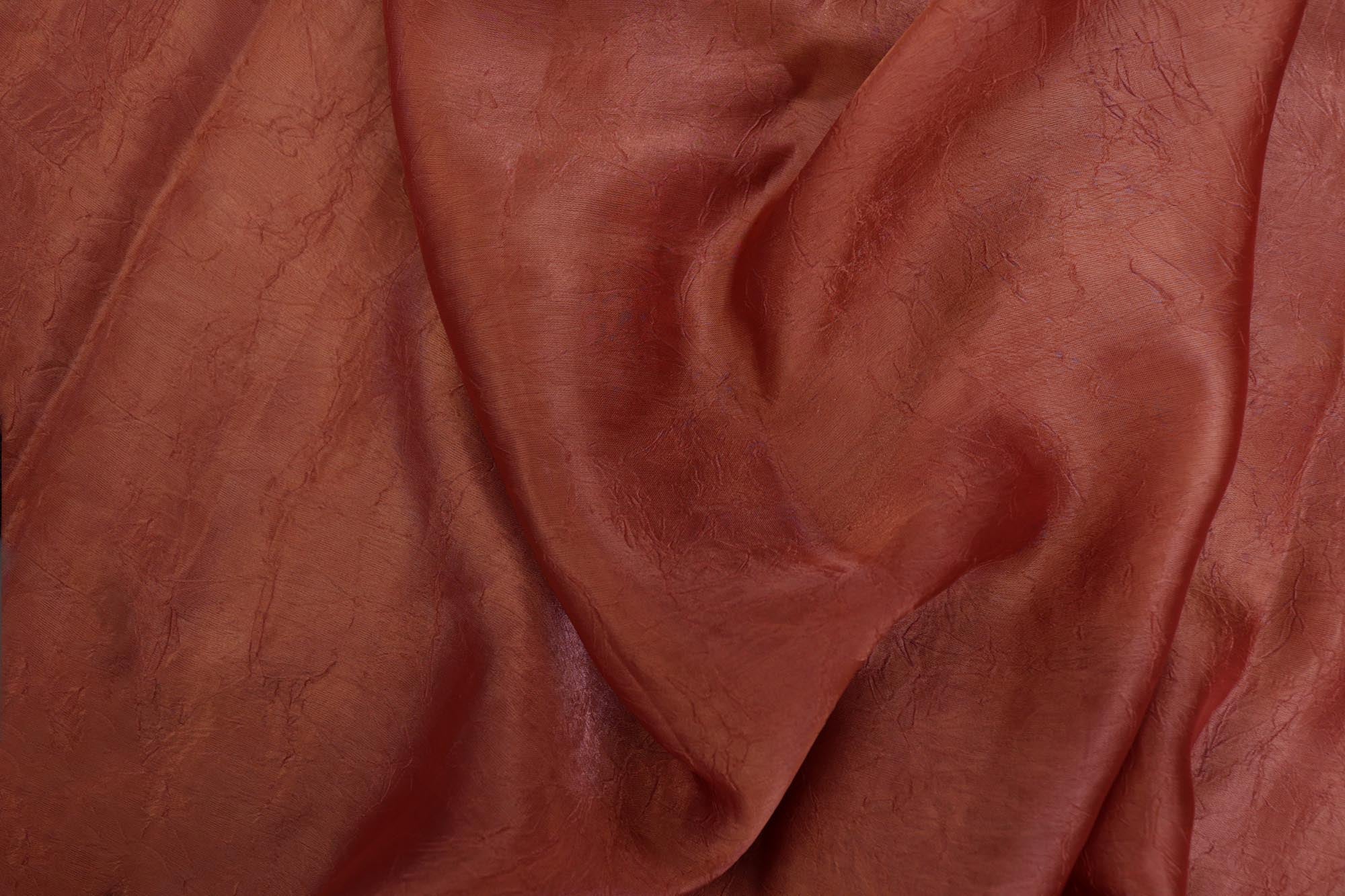 Rust coloured silk crushed texture fabric