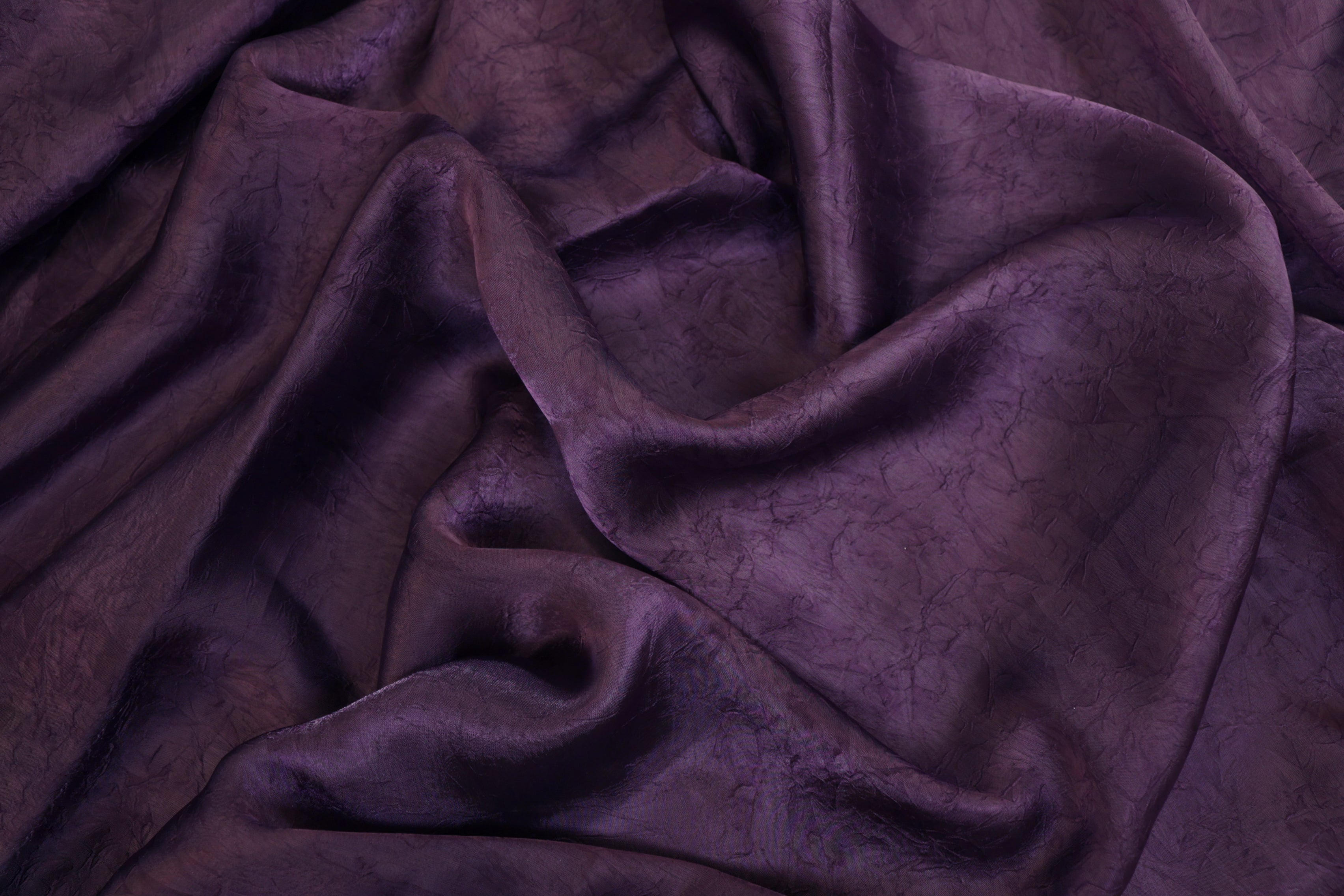 Purple coloured silk crushed texture fabric