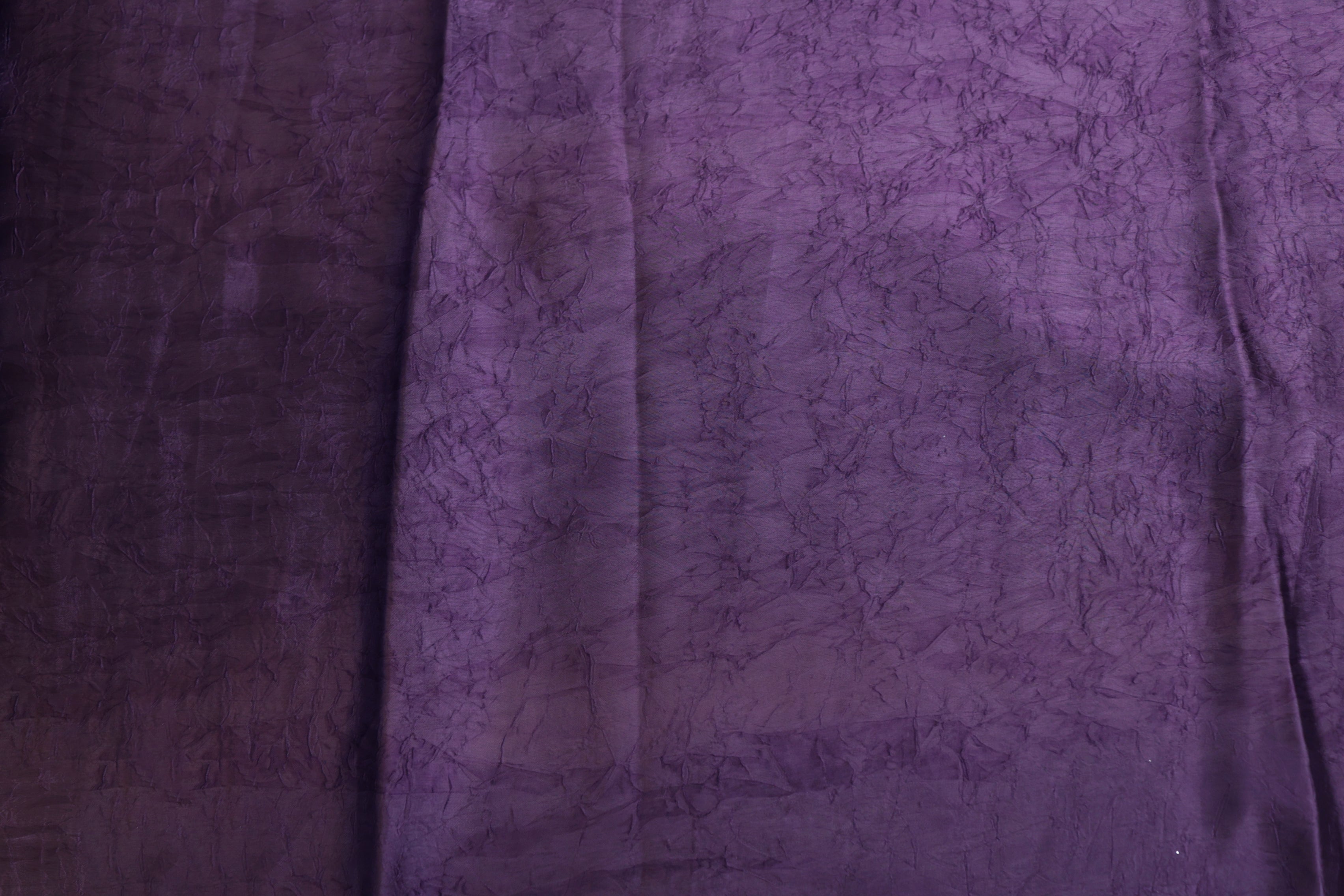 Purple coloured silk crushed texture fabric