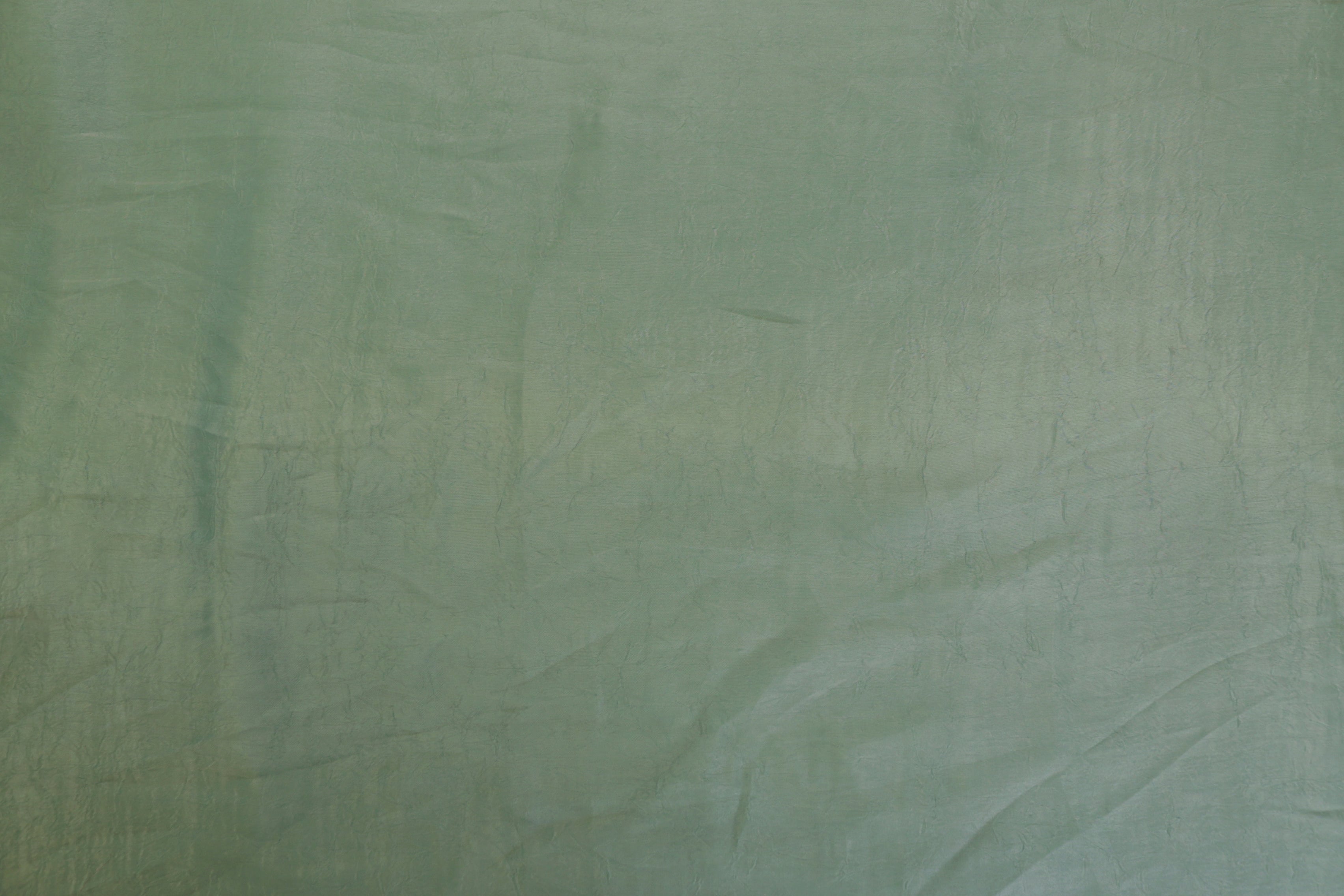 Sea green coloured silk crushed texture fabric