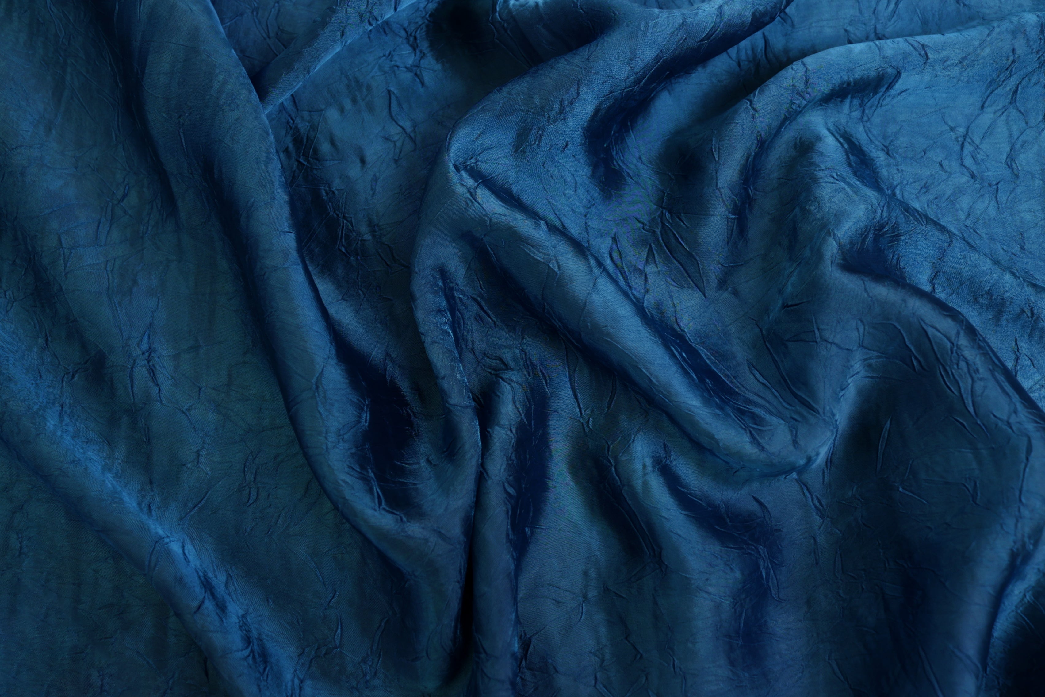 Peacock blue coloured silk crushed texture fabric