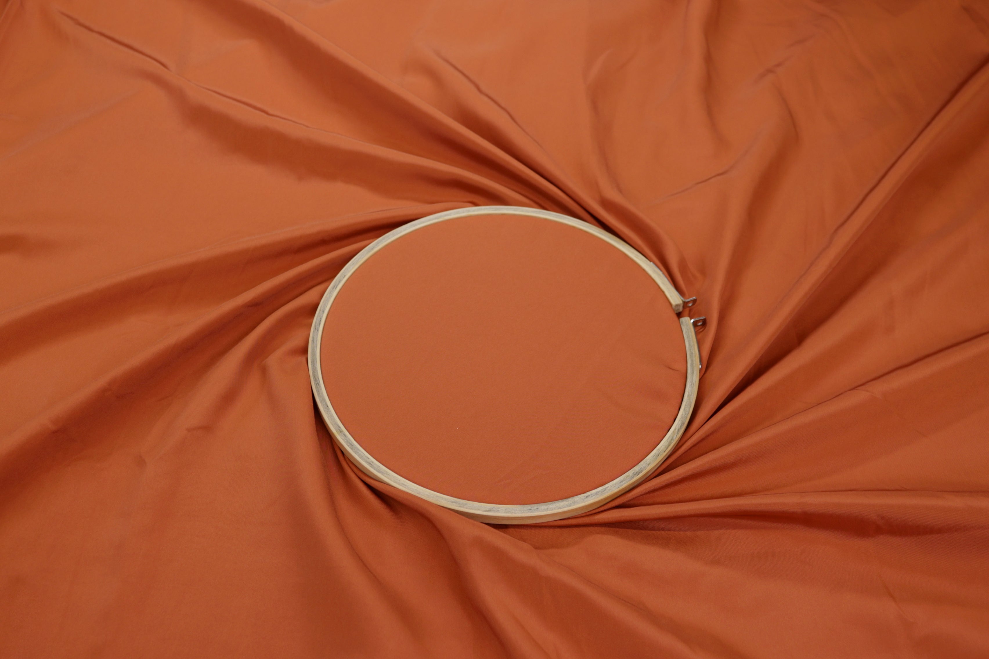 Orange coloured habutai silk fabric