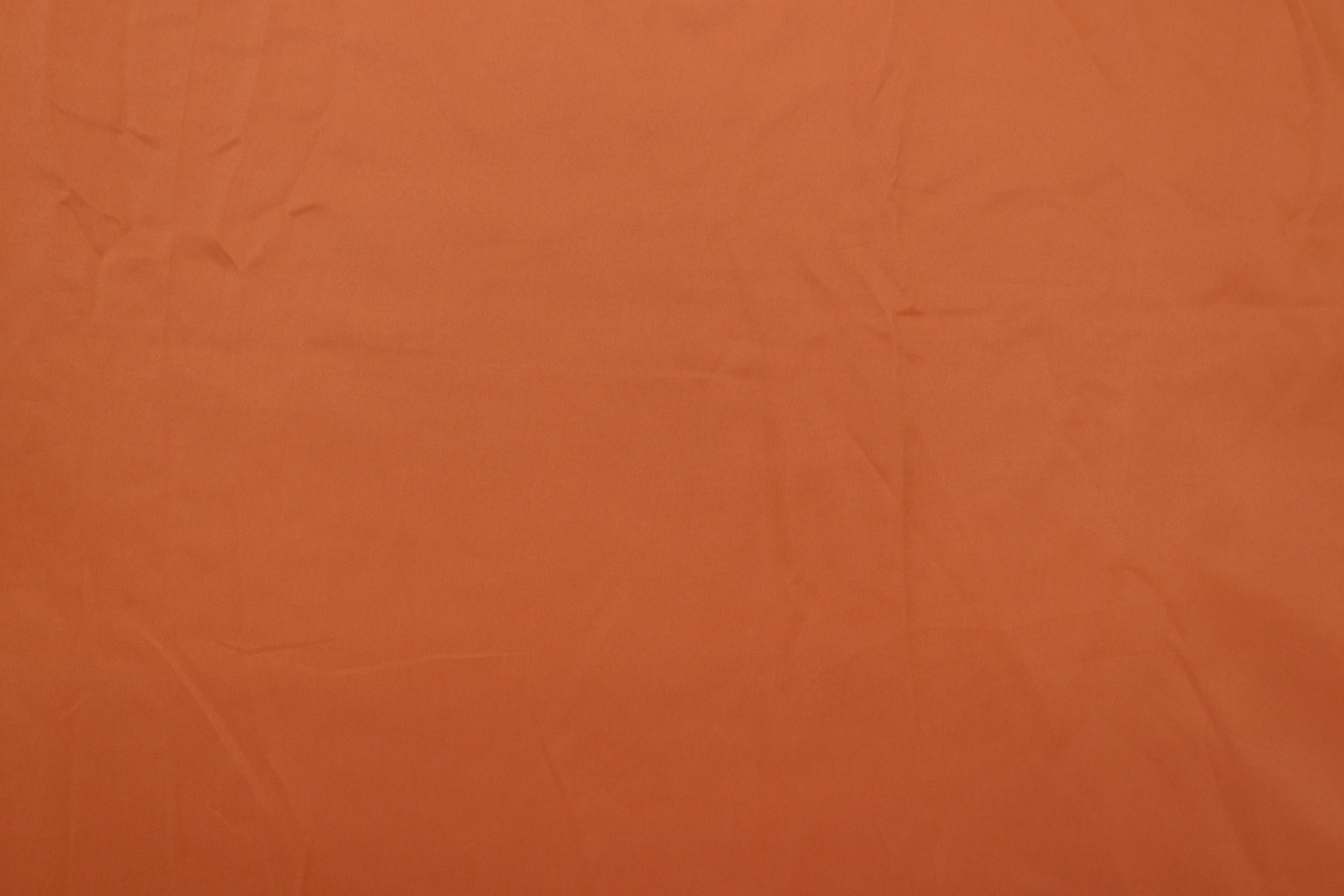 Orange coloured habutai silk fabric