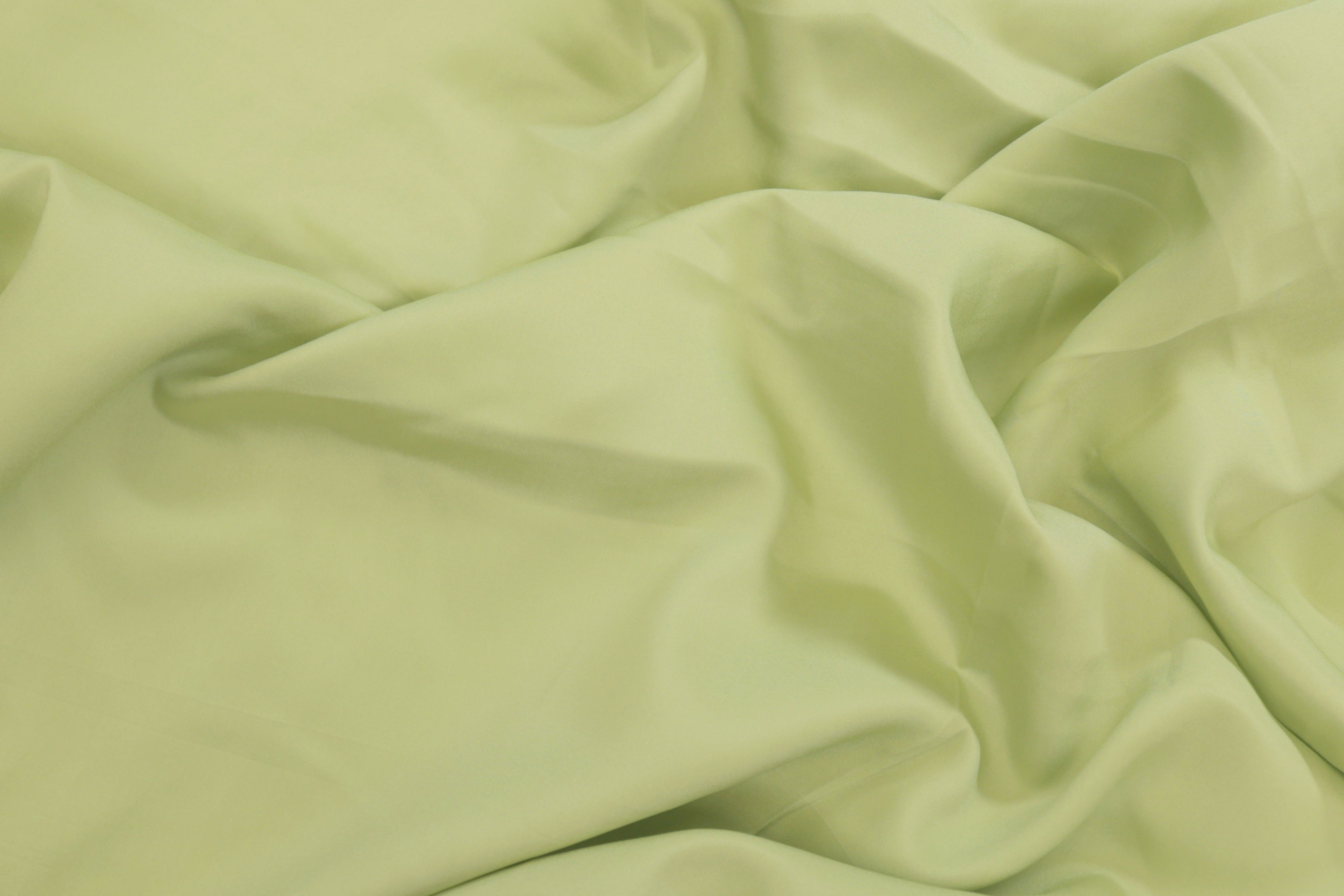 Pista green coloured  habutai silk fabric