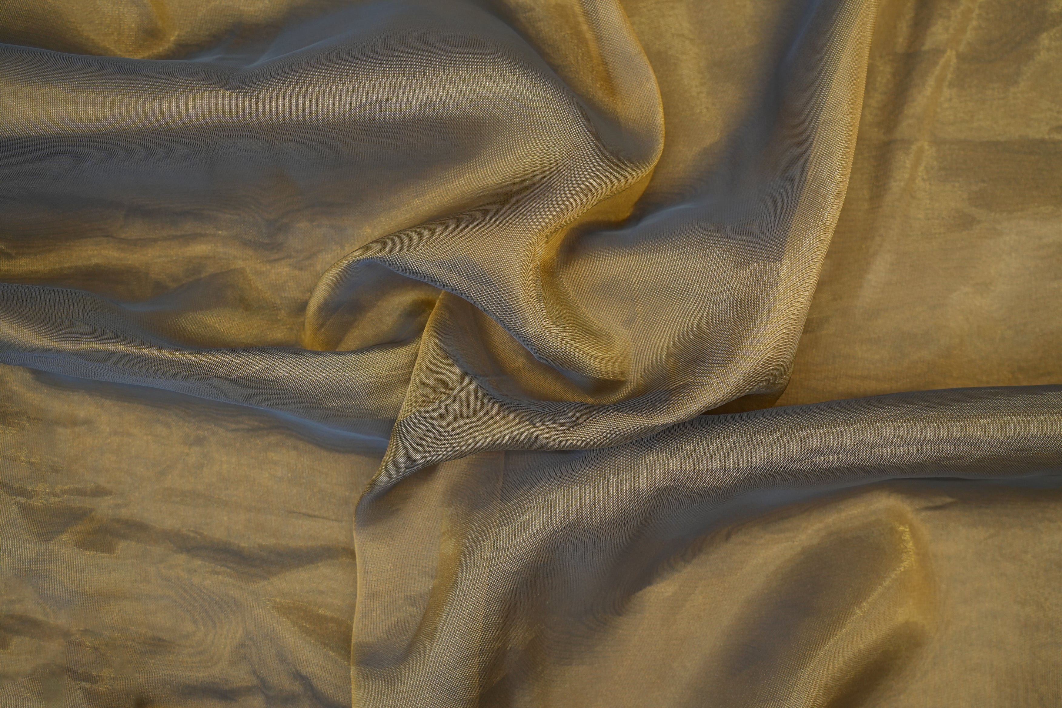 Brown coloured Soft tissue tissue fabric with gold shimmer