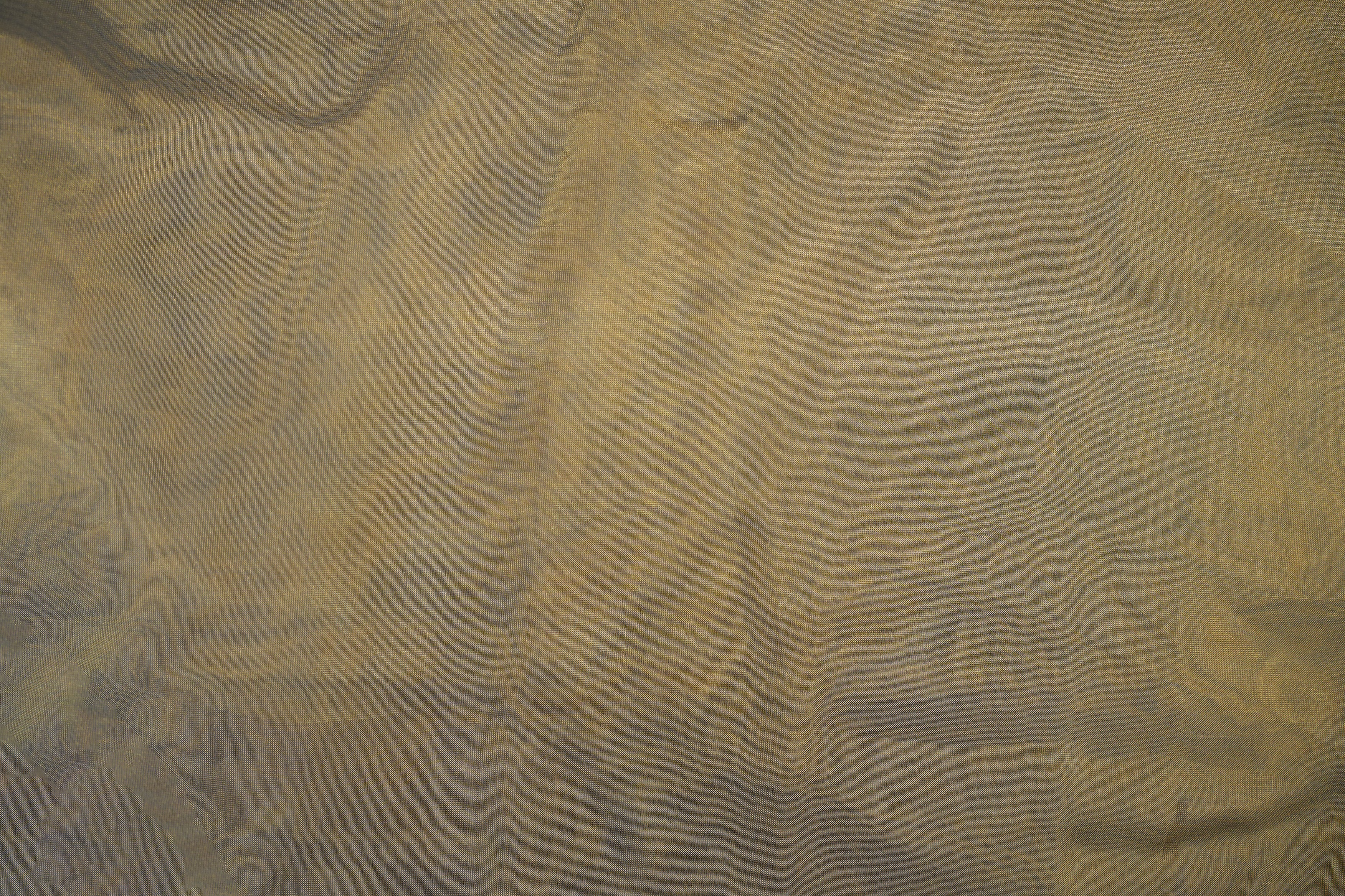 Brown coloured Soft tissue tissue fabric with gold shimmer